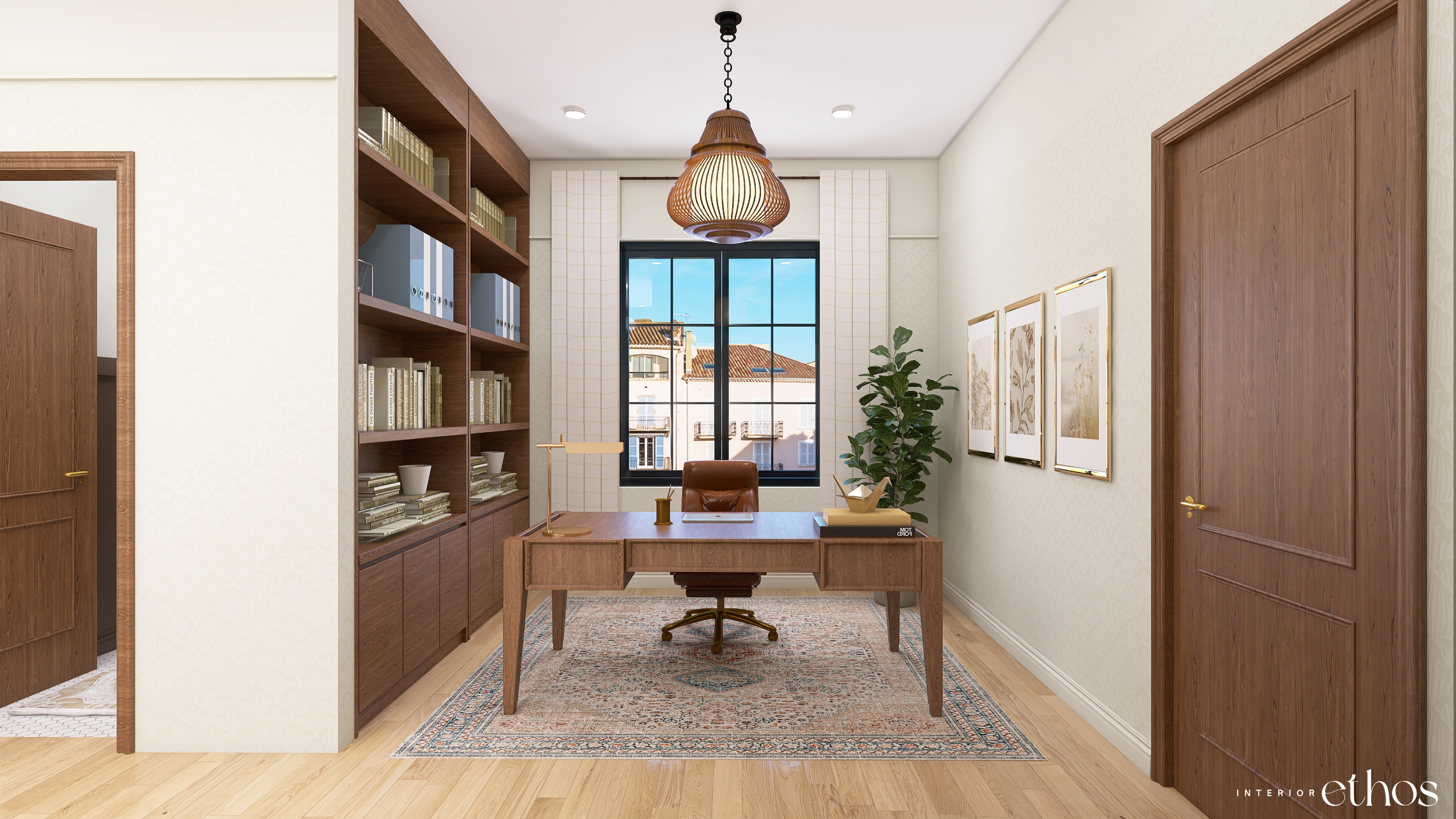 Interior Ethos original design featuring an office room with a wooden desk, leather chair, bookshelf on the left, three framed art pieces on the right wall, a large plant, and a window showing rooftops outside.