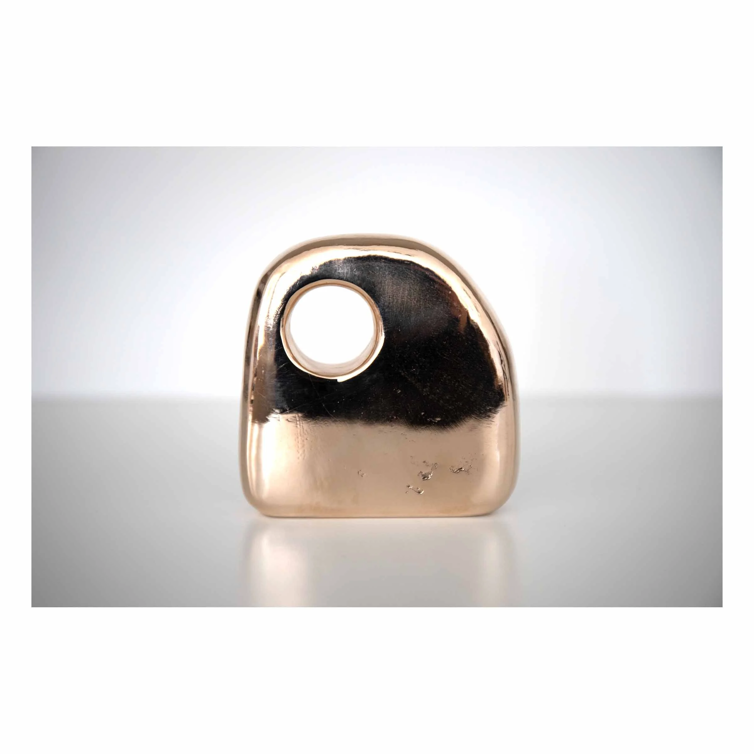 Hollow No. 2,
2025.
Bronze — 3" x 3" x .75".