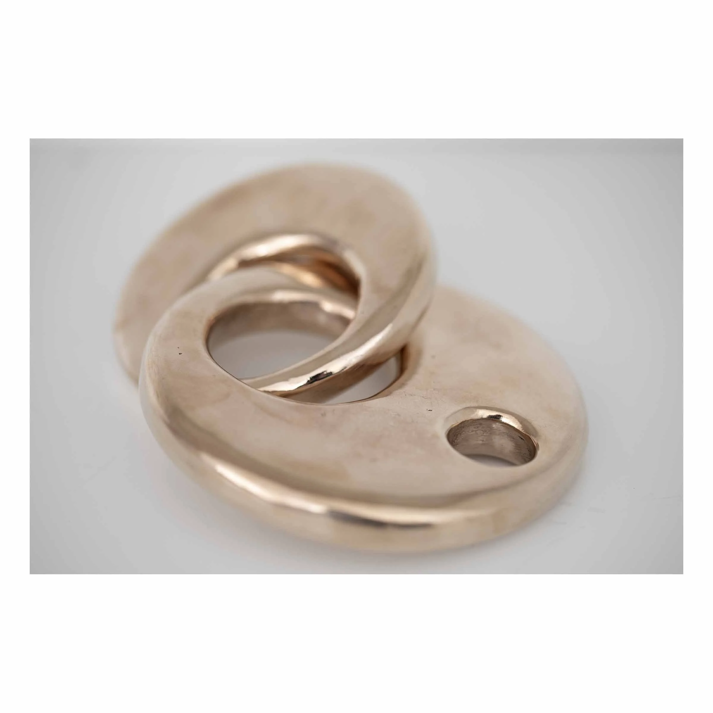 Linked No. 2,
2025.
Bronze — 6" x 4.75" x 1.75" (variable).