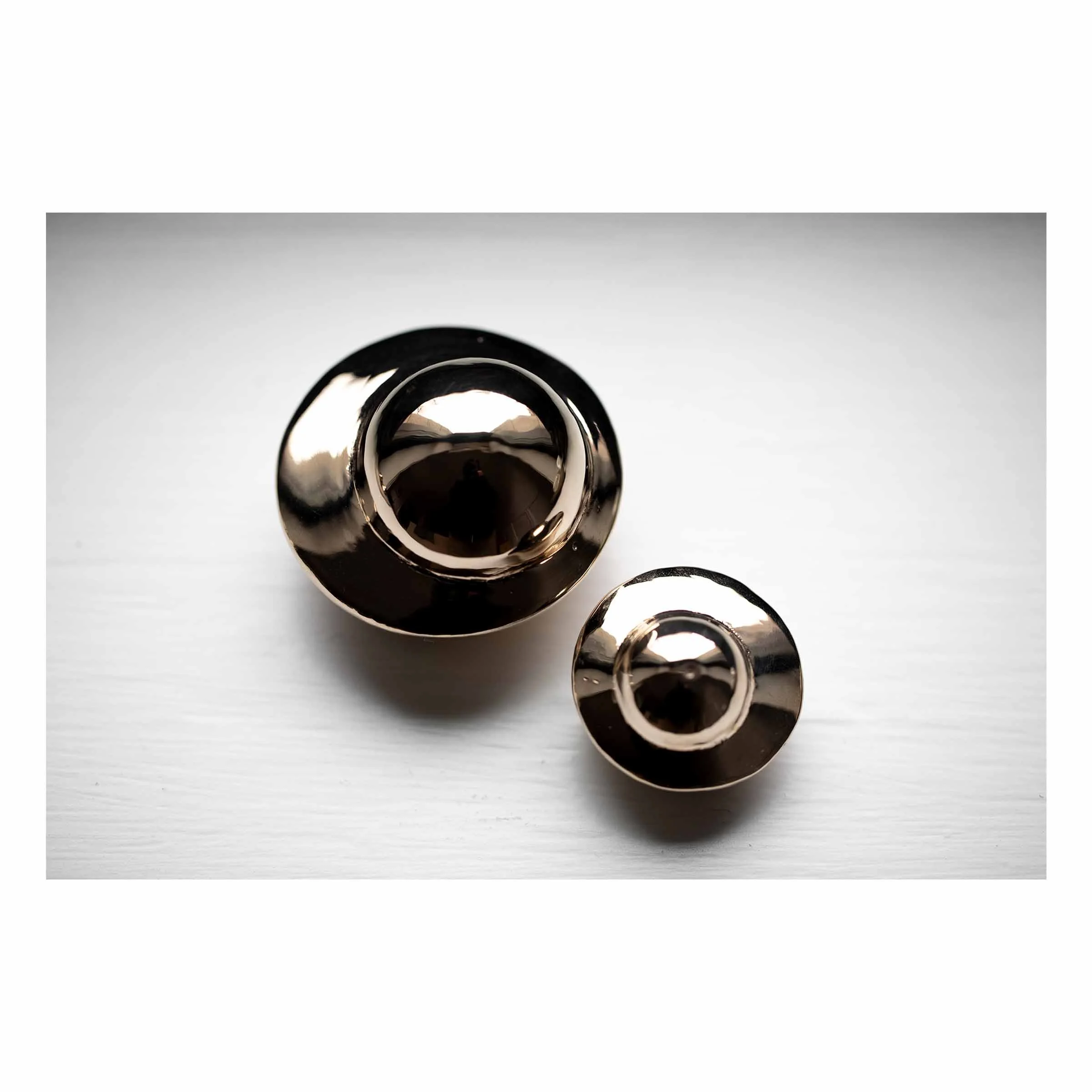 Roly-poly (large and extra small),
2025.
Bronze.