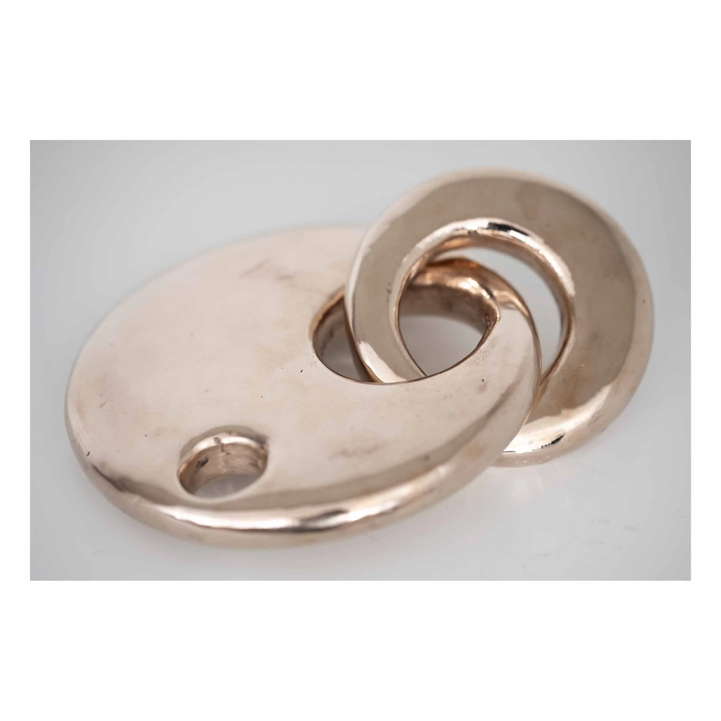 Linked No. 1,
2025.
Bronze —7" x 5.5" x 2" (variable).
