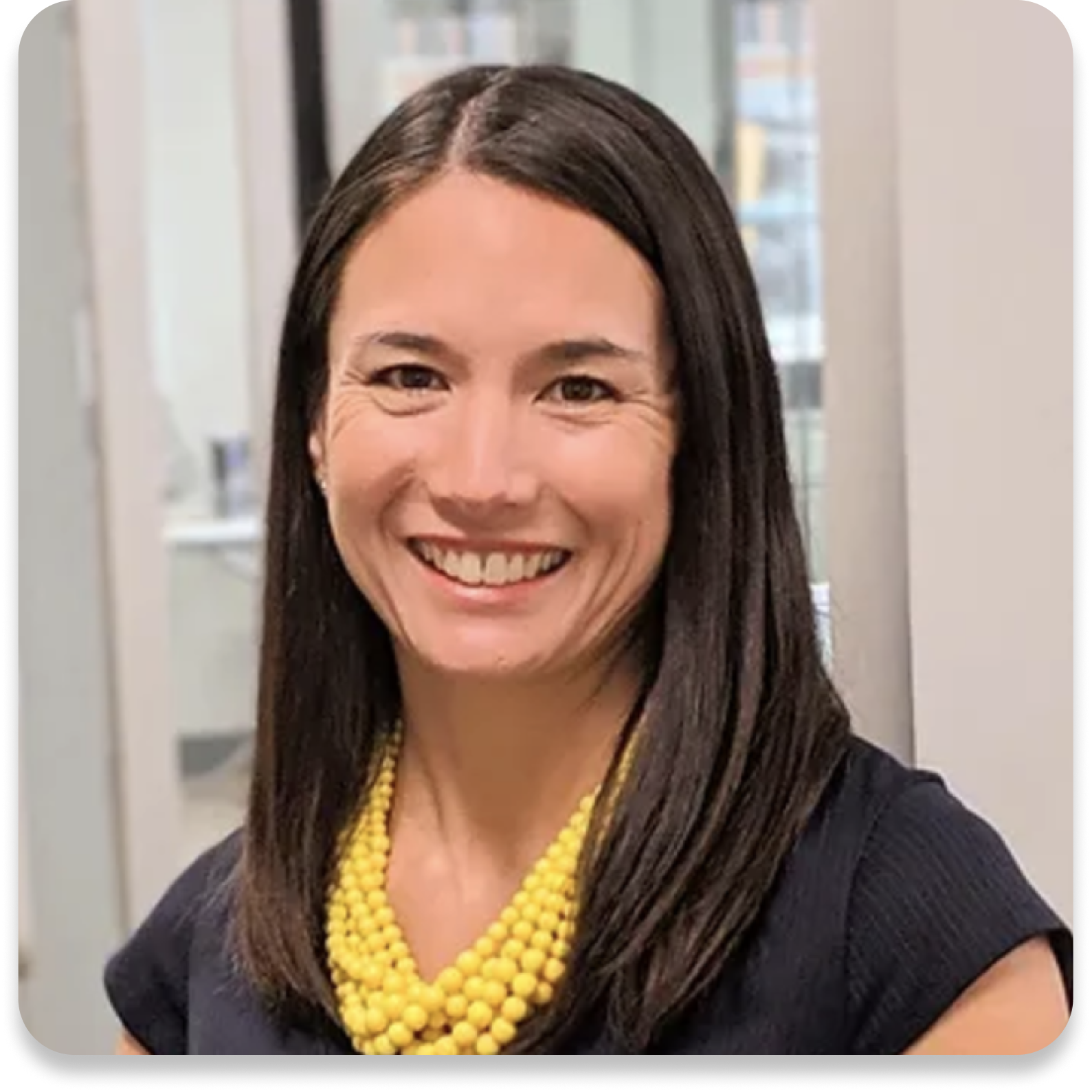 A headshot of Courtney Watson