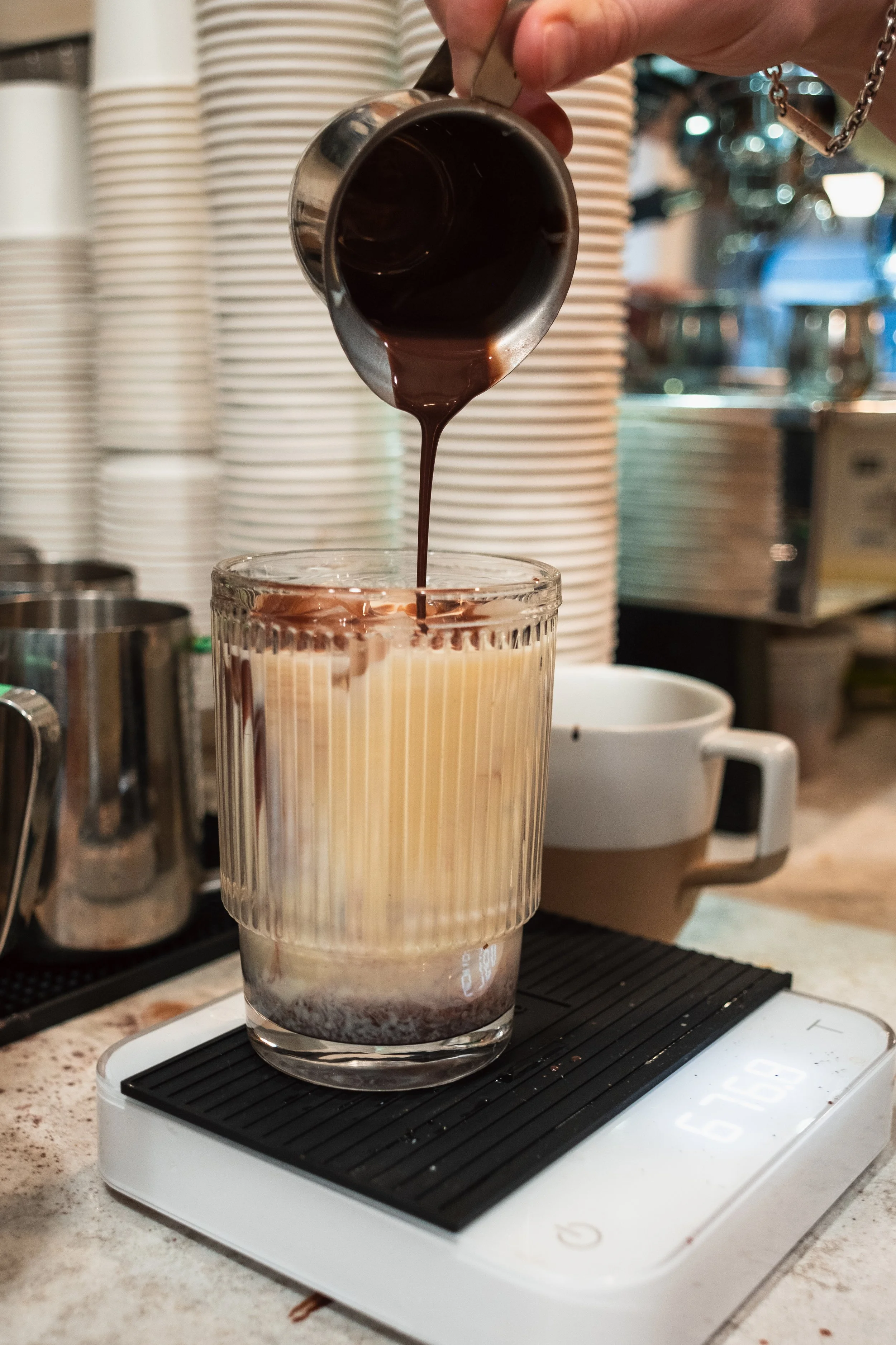 Barista Making Hot Chocolate at Butterblock & Co in Calgary, AB. Photograph by Zachery Knudson. All rights reserved.