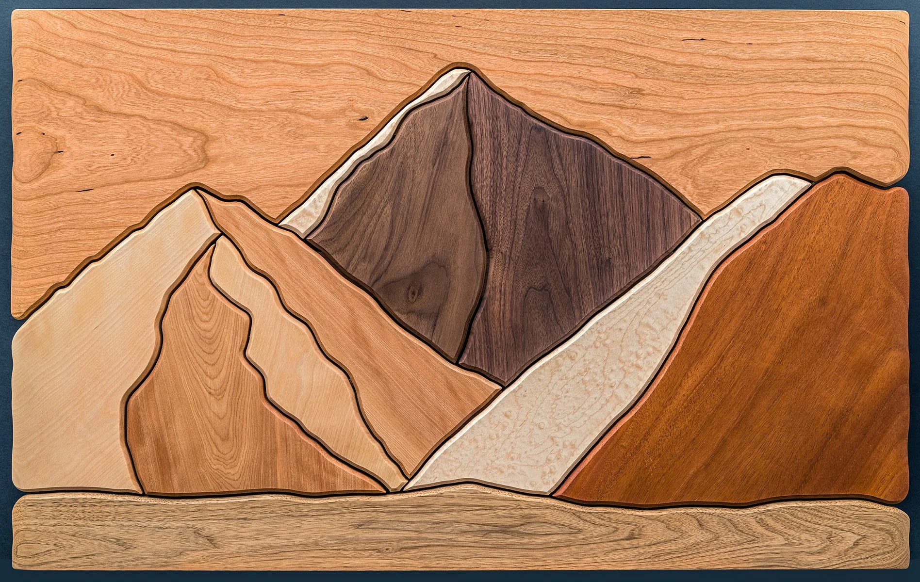 Our client from Sierra Nevada wanted us to replicate their native view. The cherry sky slab was pretty impressive in size