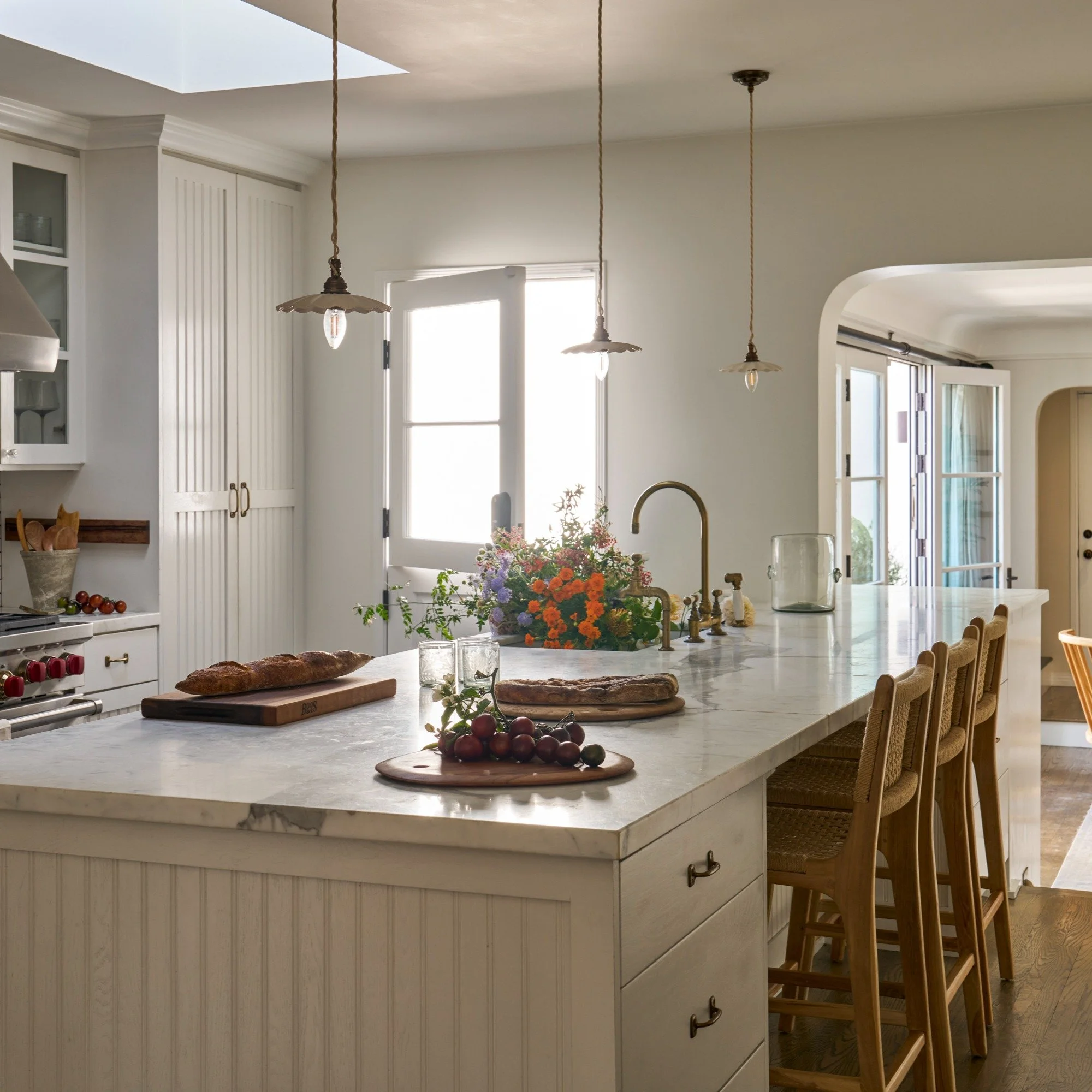 It's been a week! Excited for some upcoming shoots, but in the meantime a little look back at this kitchen. These scalloped pendants were the perfect touch for our Venice client.
