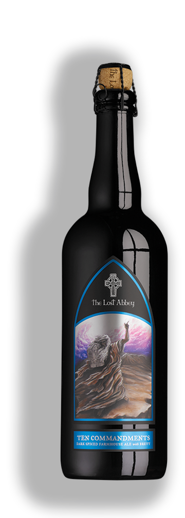 A dark beer bottle with a label featuring a scene from the biblical story of Moses parting the Red Sea, titled 'The Lost Abbey Ten Commandments, Dark Alced Farmhouse Ale with Spices,' and sealed with a cork.