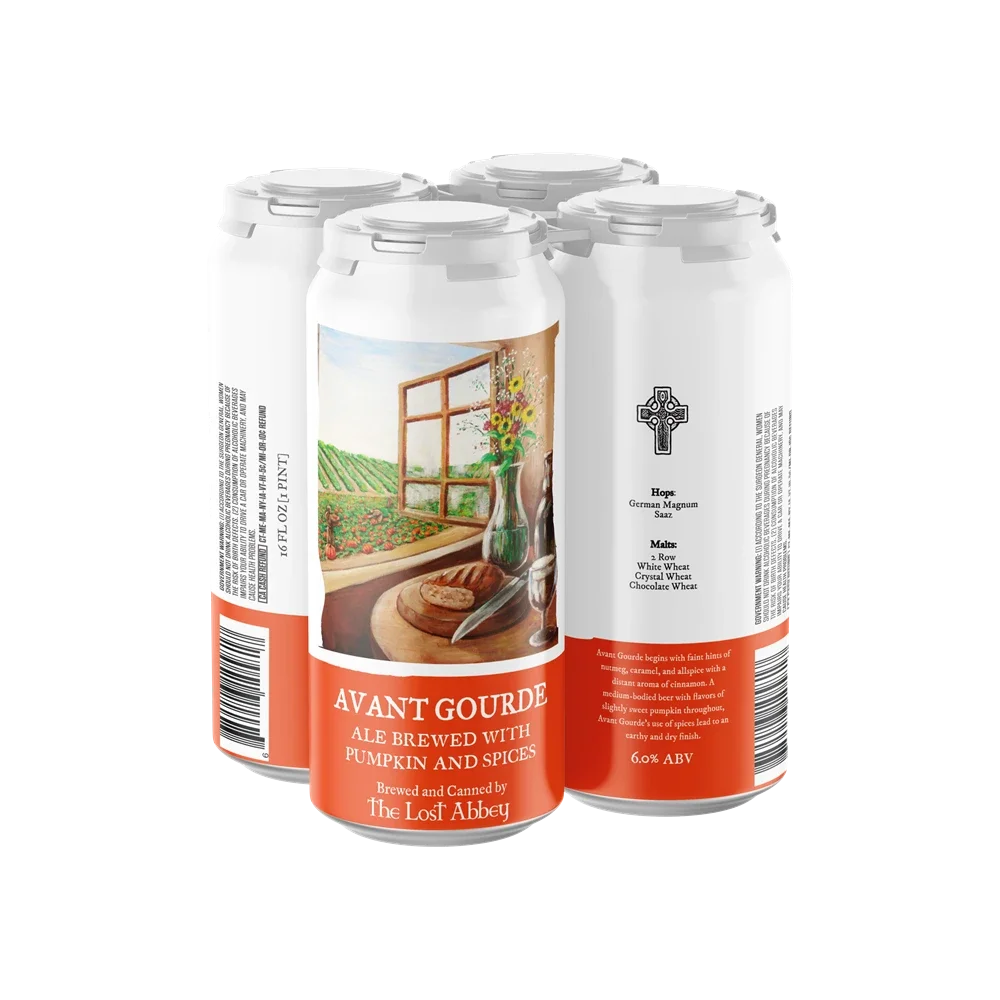 Six cans of Avant Garde ale brewed with pumpkin and spices, featuring a label with a painting of a window overlooking a pumpkin patch and a table with a jar of flowers and a loaf of bread.