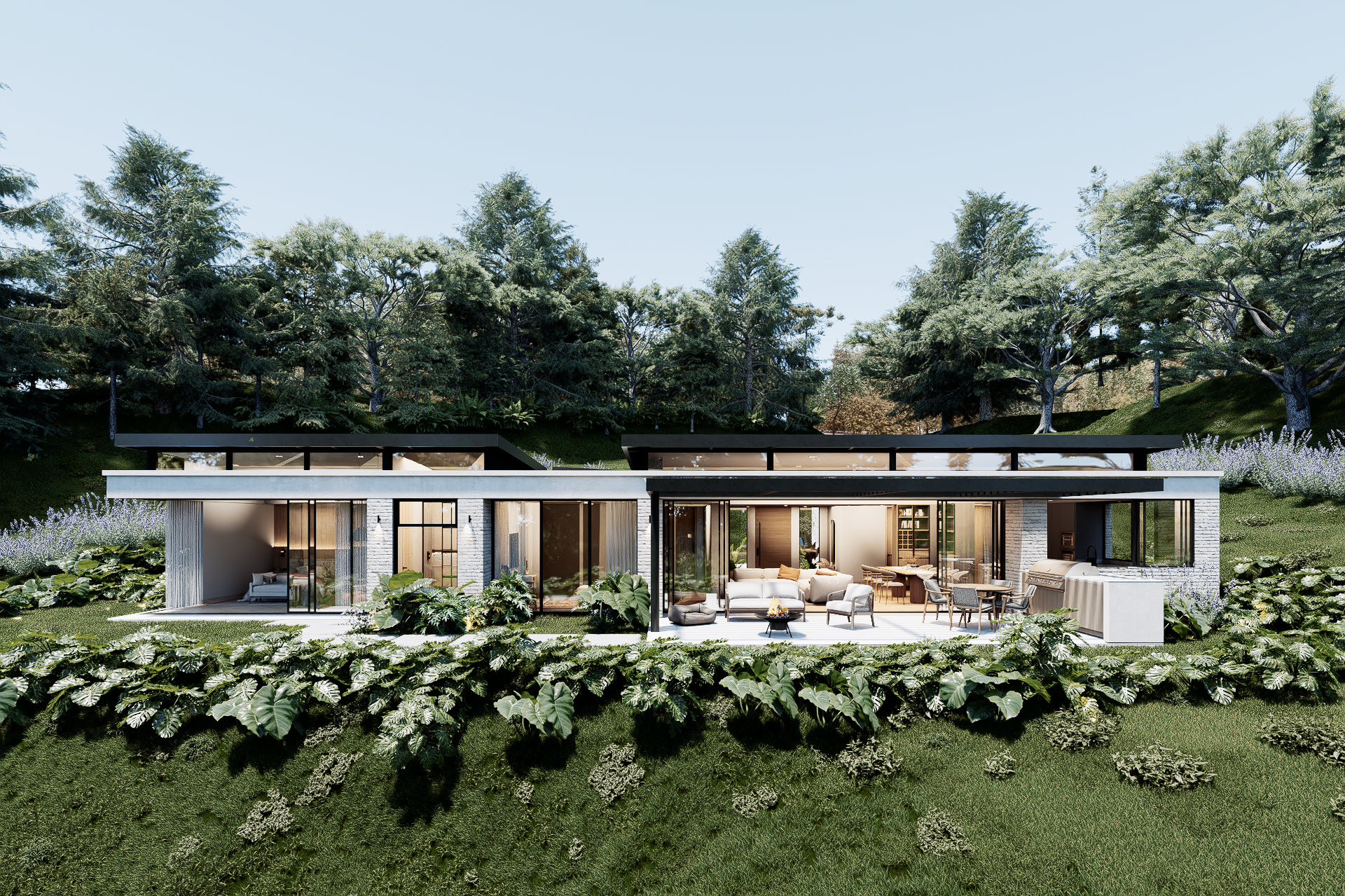 Modern single-story house with large glass windows and a spacious outdoor patio, surrounded by lush greenery and trees.