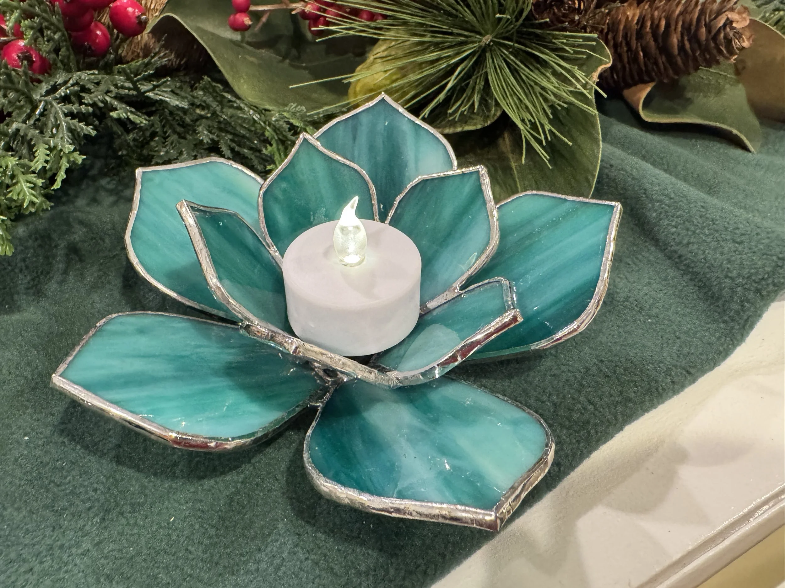 3D succulent made from green stained and blue swirled stained glass