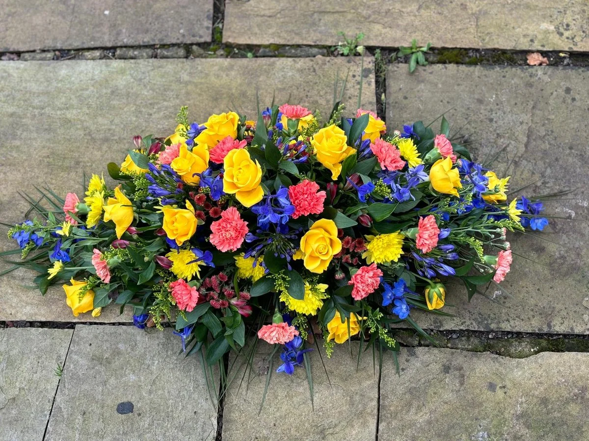 Deluxe Casket Spray (Blue, Pink & Gold)