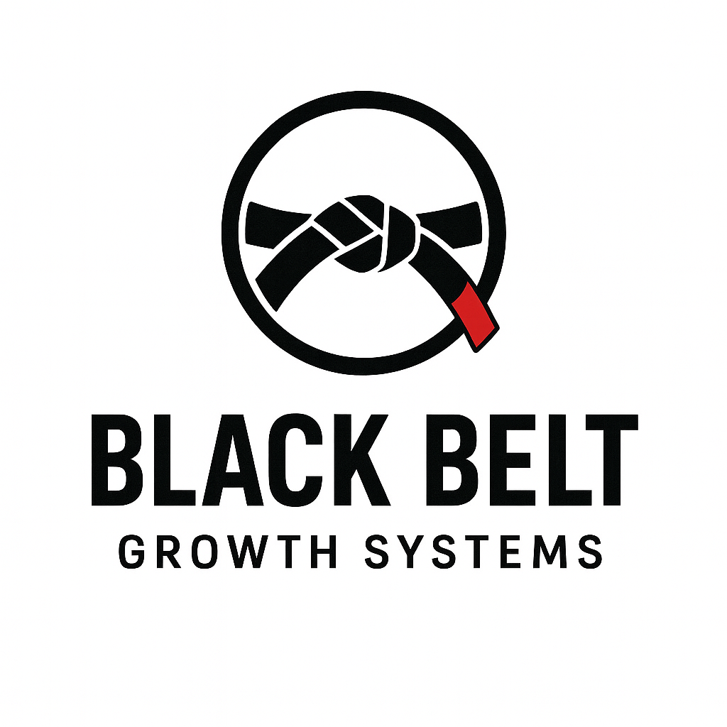 Logo with a circular design featuring a knotted black belt with a red end, and the text "Black Belt Growth Systems" below.