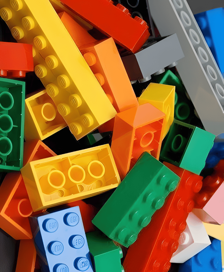 Assorted plastic building blocks in bright colors for creative kids construction play