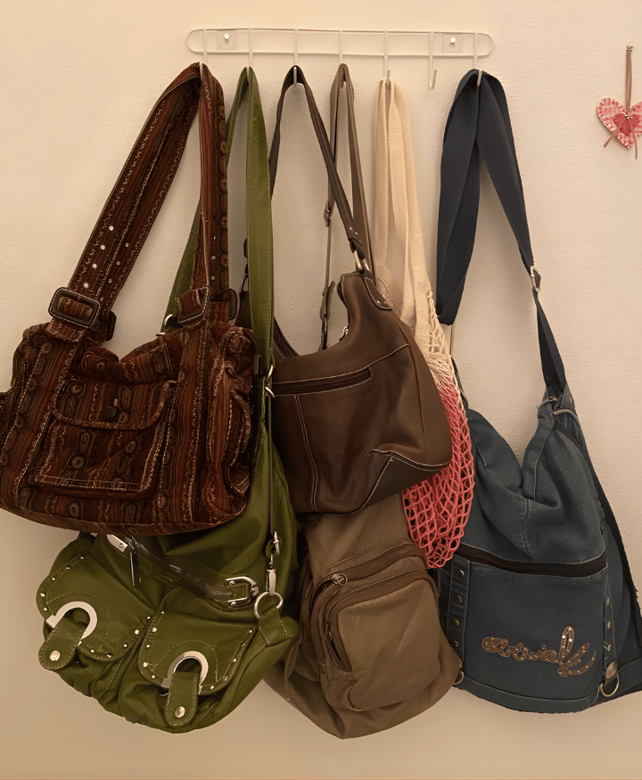 Assorted vintage purses and handbags including leather shoulder bags and retro styles