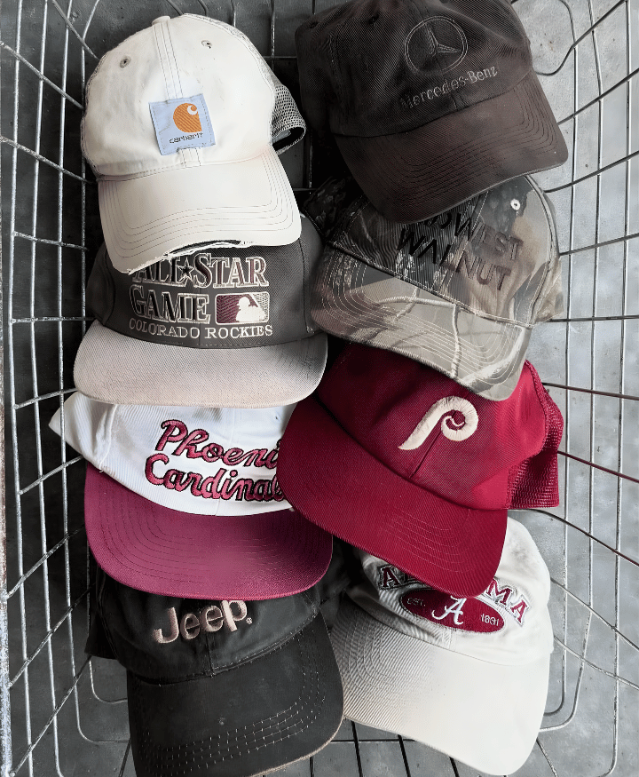 Mixed vintage and branded hats including baseball caps with logos and casual styles for sale