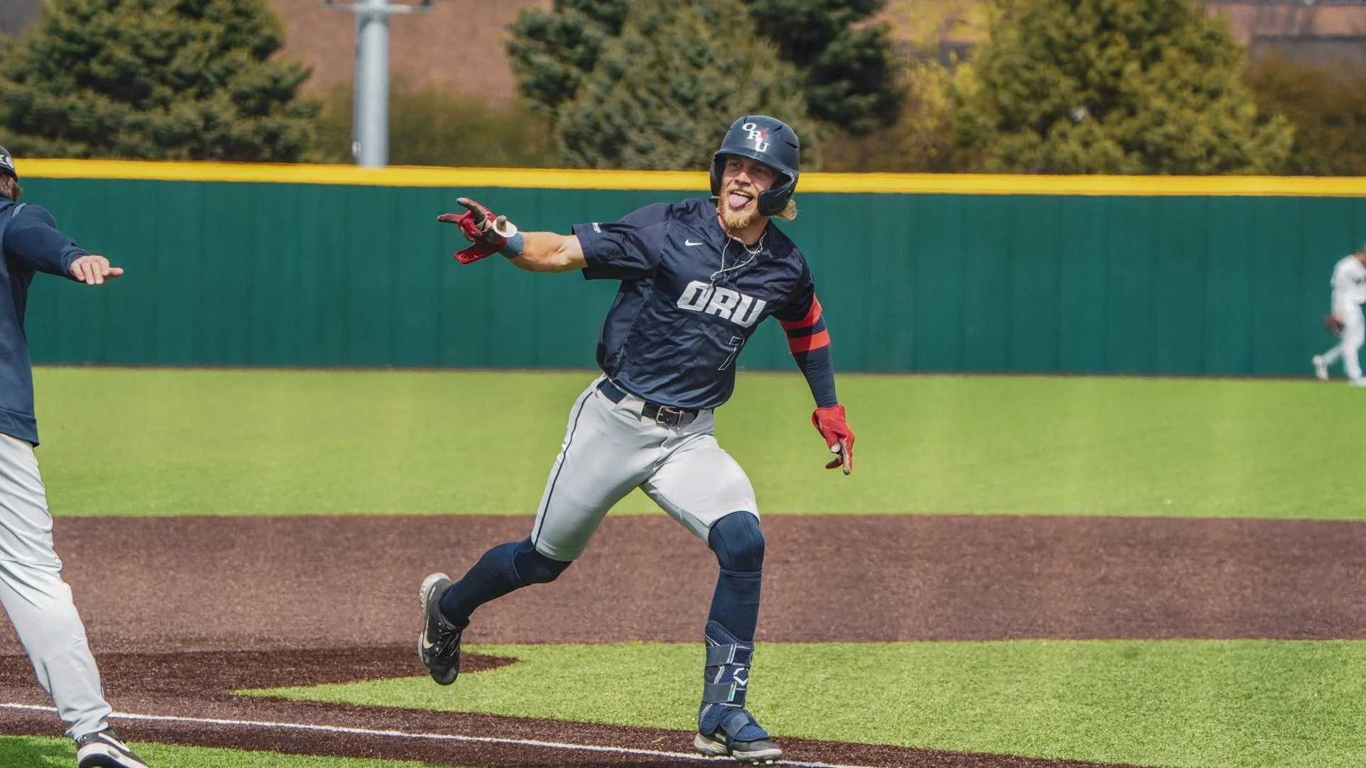 A baseball player in a uniform with