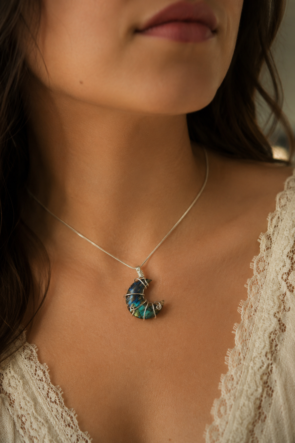 Closeup of Woman wearing Labradorite Necklace.png