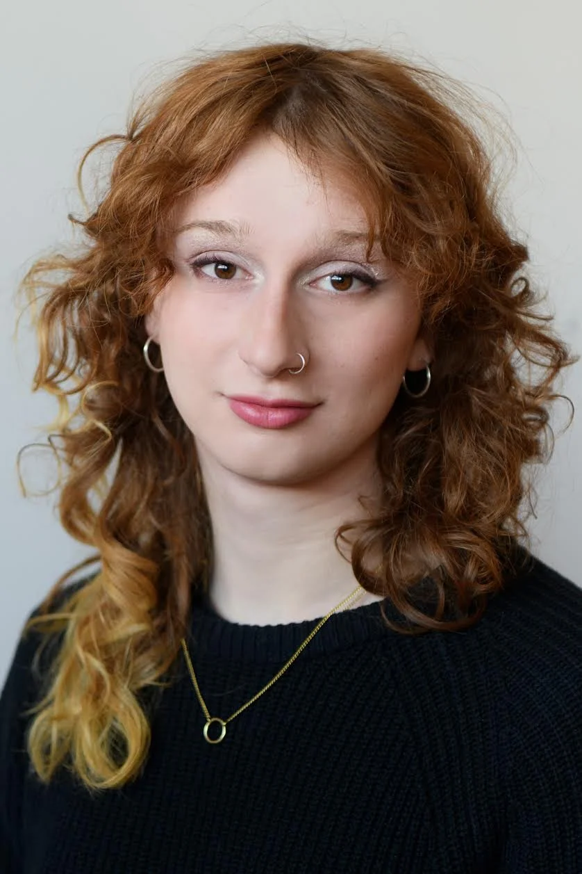 The smiling face of Bri Fallen.