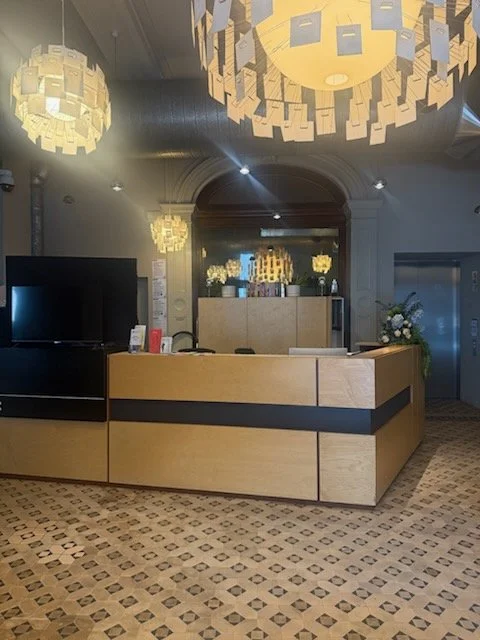 A costumer service desk in the lobby of The Wheeler Centre