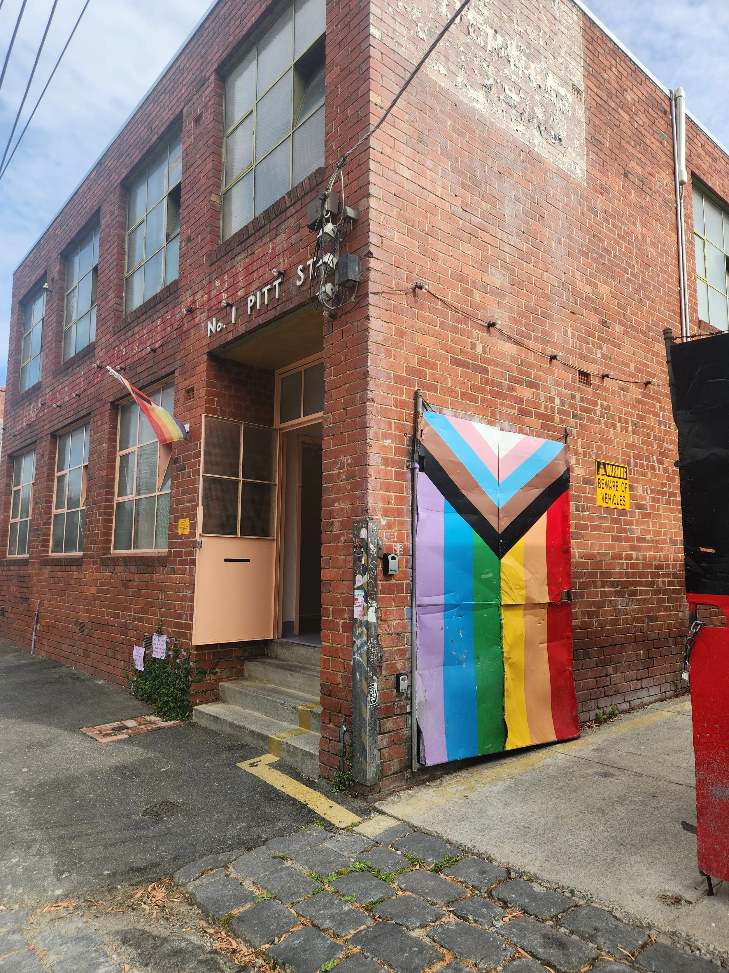 The front entrance of Studio Take Care, visible from Pitt Street