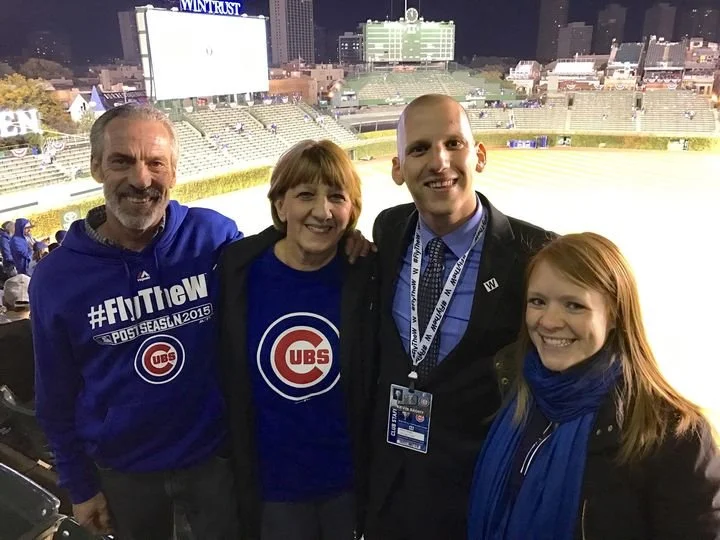 Kevin with Parents and FlyTheW sweatshirt.jpg