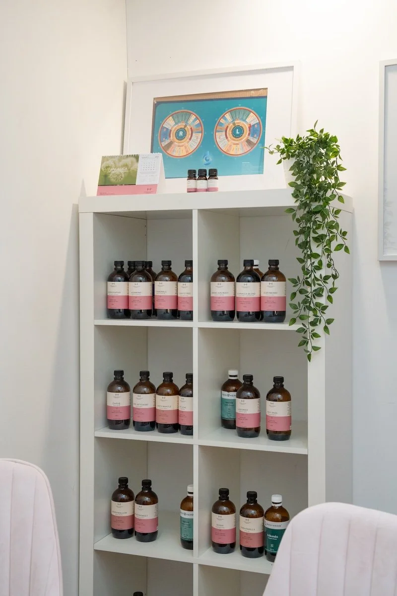 Clinic shelving with herbal remedies and essential oils at Port Melbourne Traditional Chinese Medicine, holistic wellness clinic.