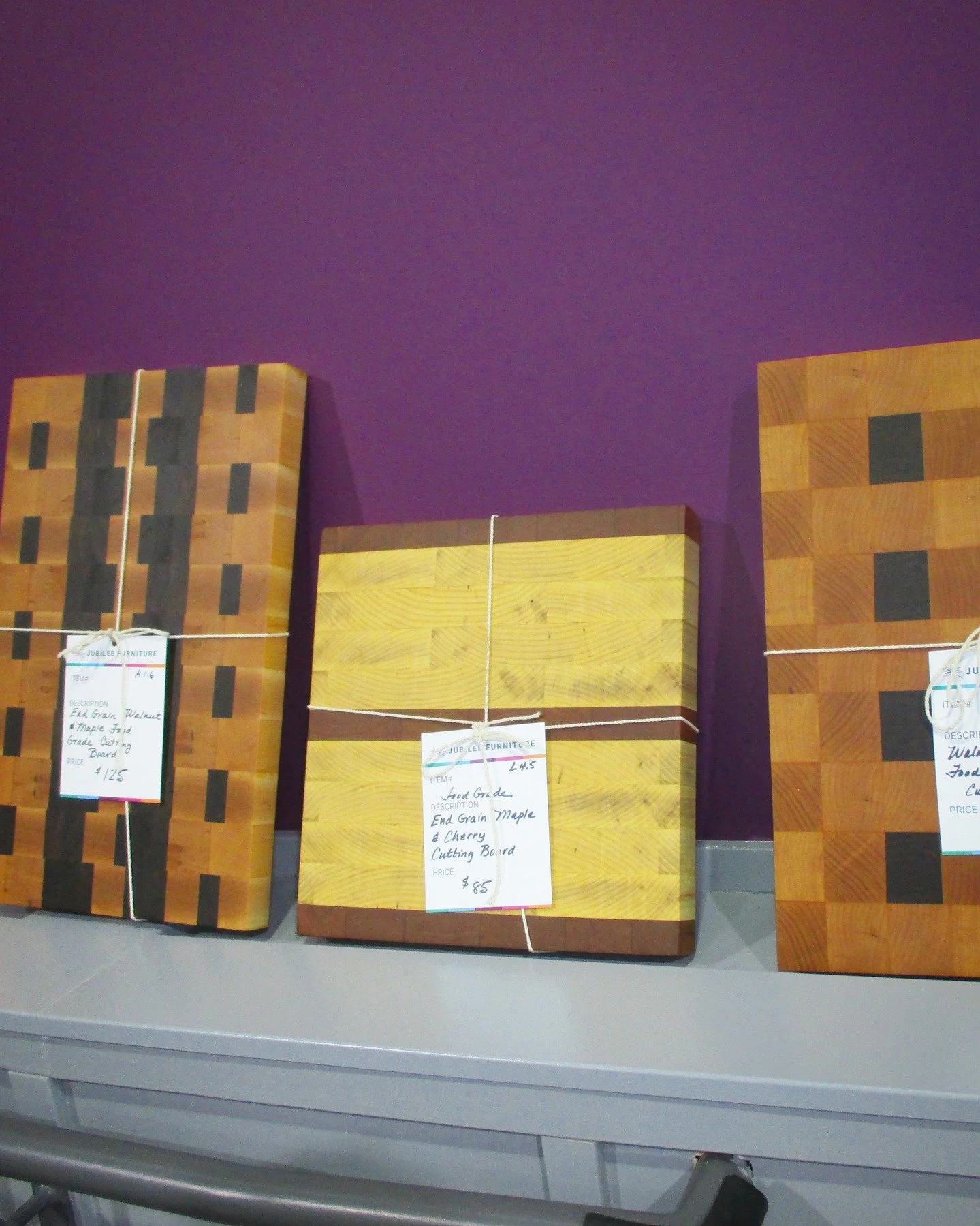 These end-grain cutting boards are handcrafted by a Jubilee volunteer using reclaimed wood from broken or leftover furniture pieces. 

Designed to be more resistant to knife marks and finished with a food-safe oil, each one is truly one of a kind. 

