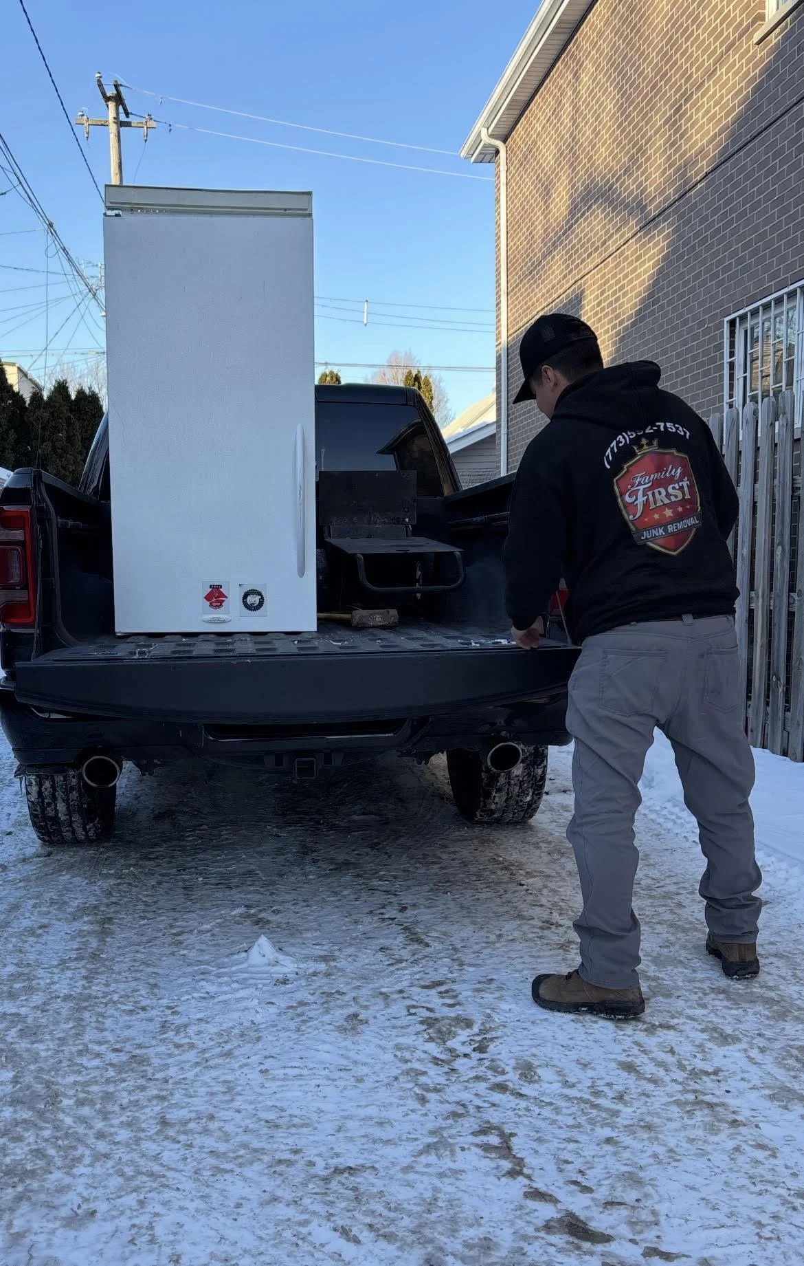 refrigerator removal service by local junk hauling business