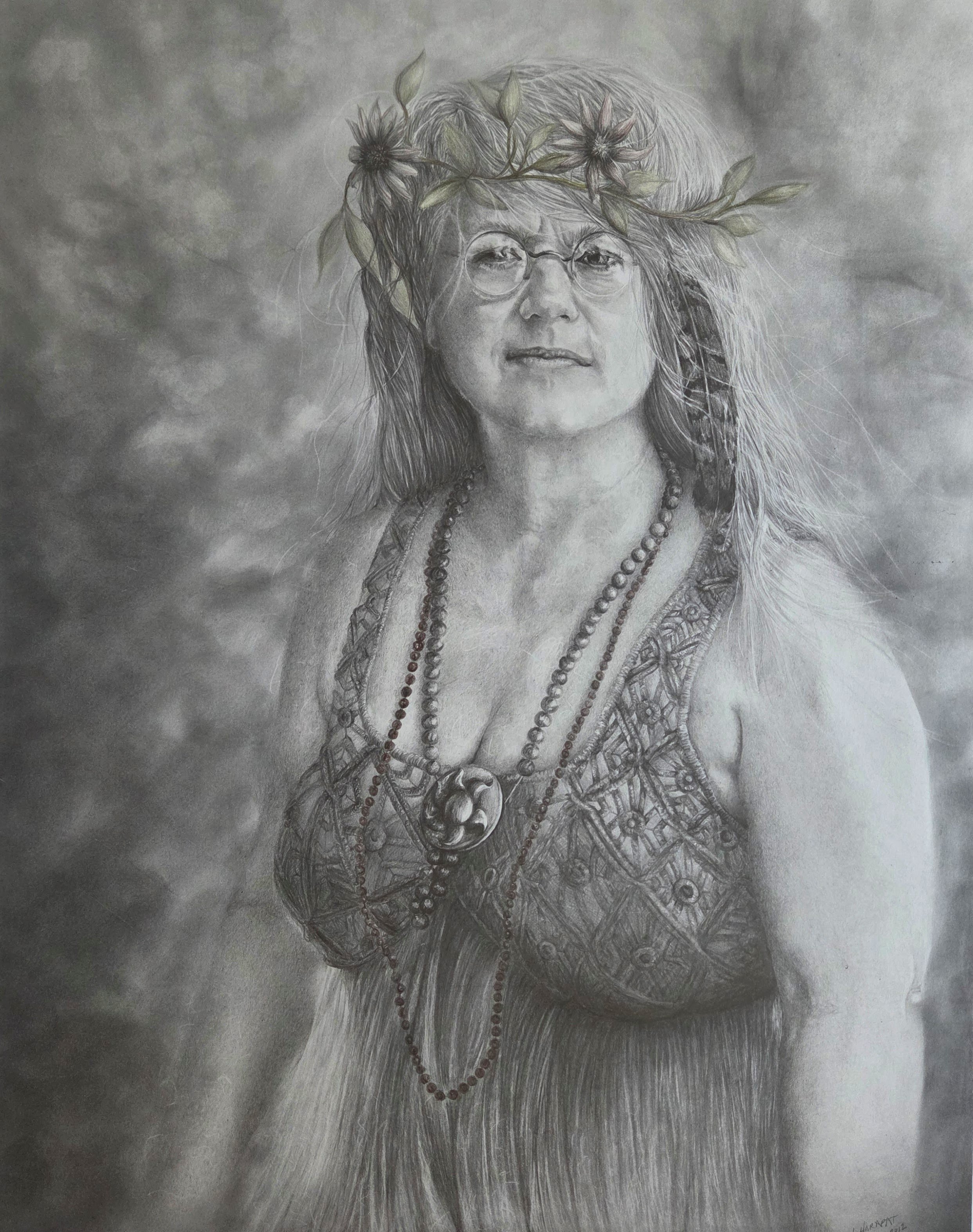 A detailed pencil drawing of a woman wearing glasses, with long hair, a floral crown, multiple necklaces, and a patterned top.