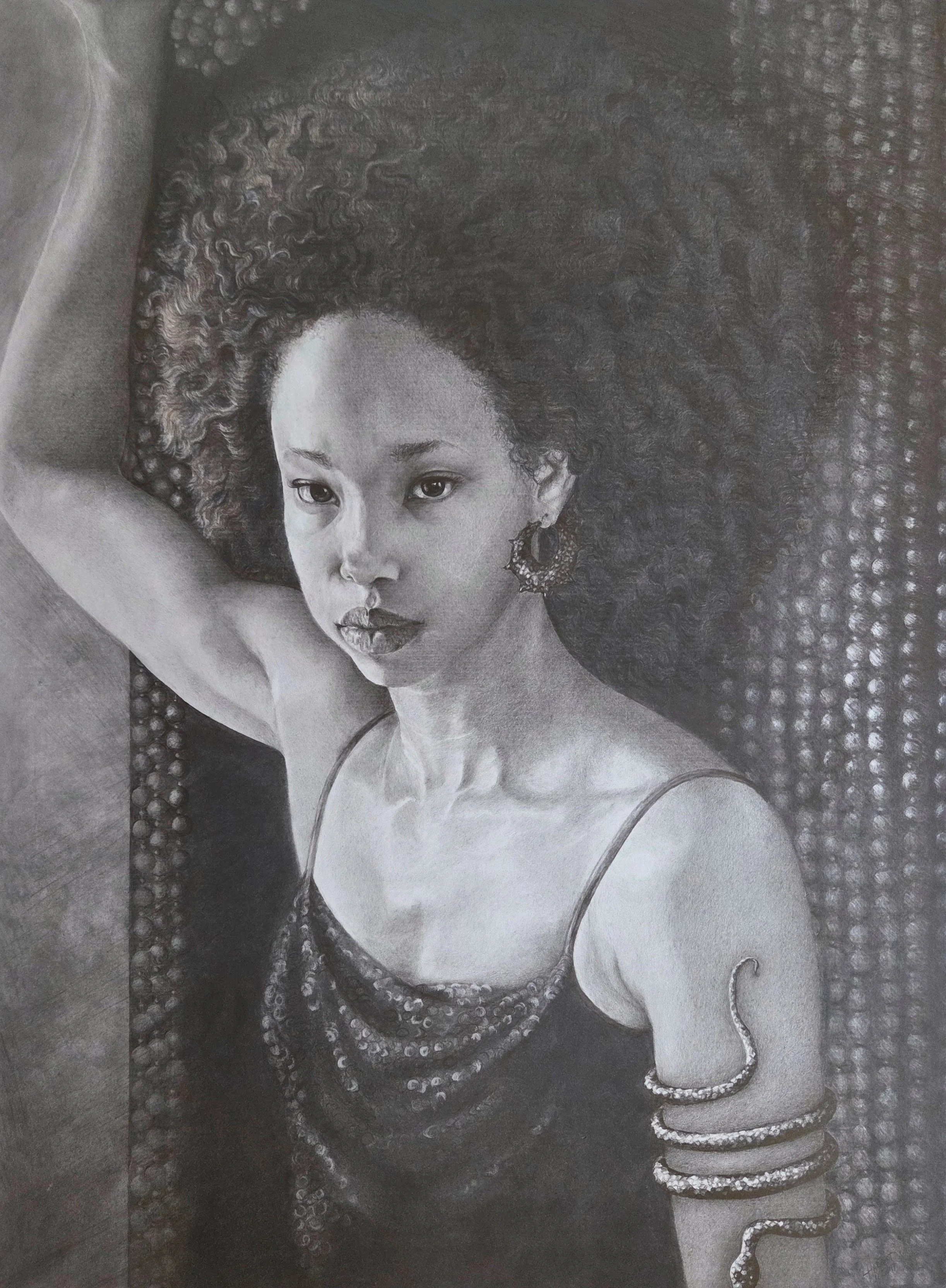 Black and white portrait of a woman with her arm raised and her head slightly turned to the side. She has curly hair, wears a sleeveless dress with a draped neckline, large earrings, and multiple bracelets on her upper arm. She has a confident expres