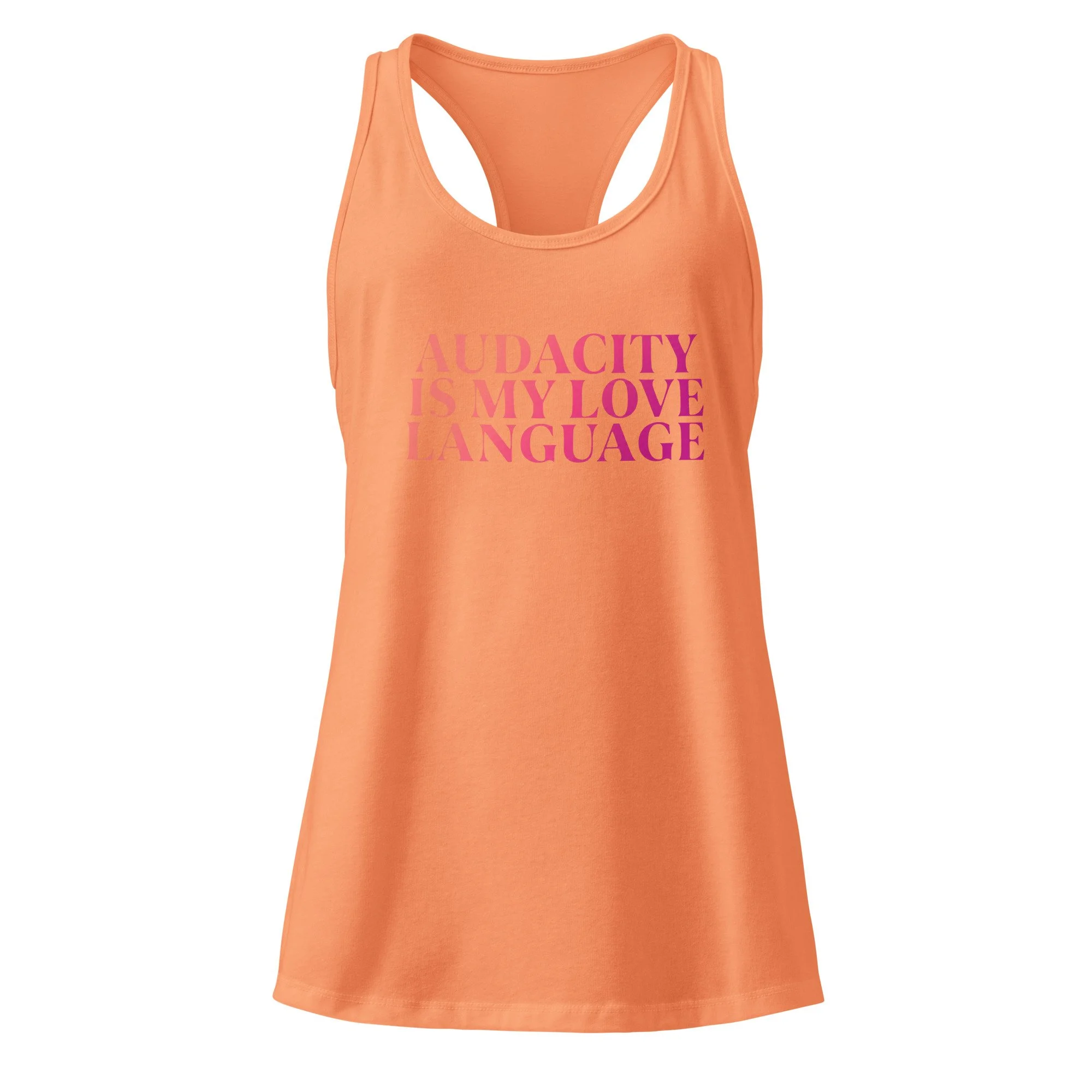 Light orange racerback tank top with “Audacity Is My Love Language” graphic in pink text on front