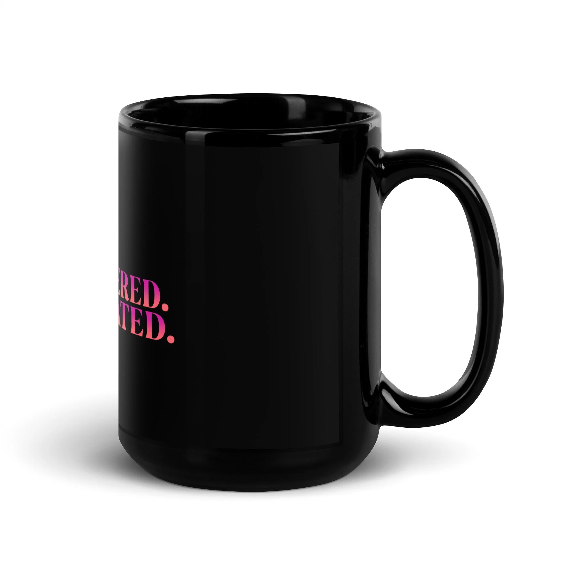 Side view of the black glossy 15 oz mug with pink "HOT.UNBOTHERED.CAFFEINATED. on the front.