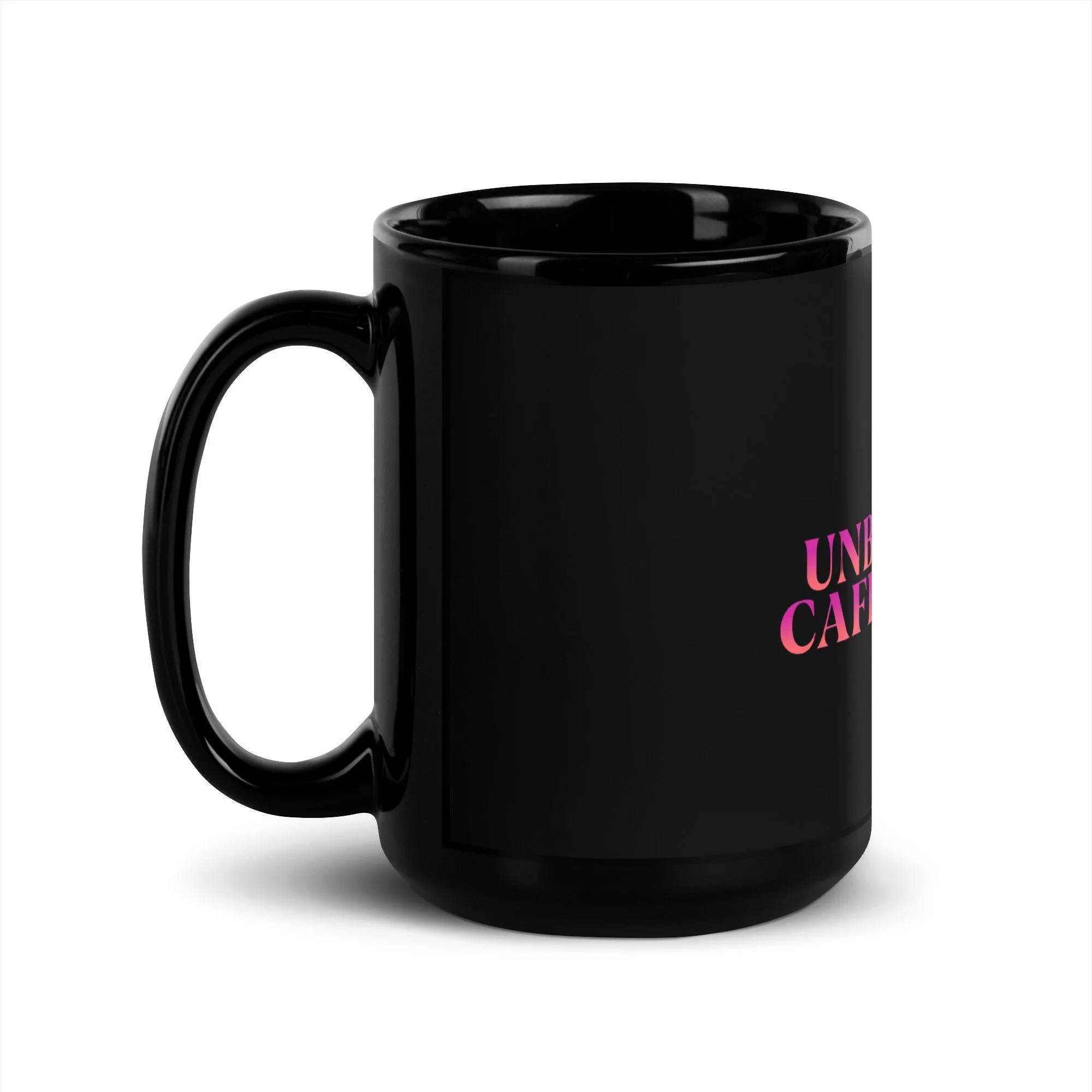 Side view of the black glossy 15 oz mug with pink "HOT.UNBOTHERED.CAFFEINATED. on the front.