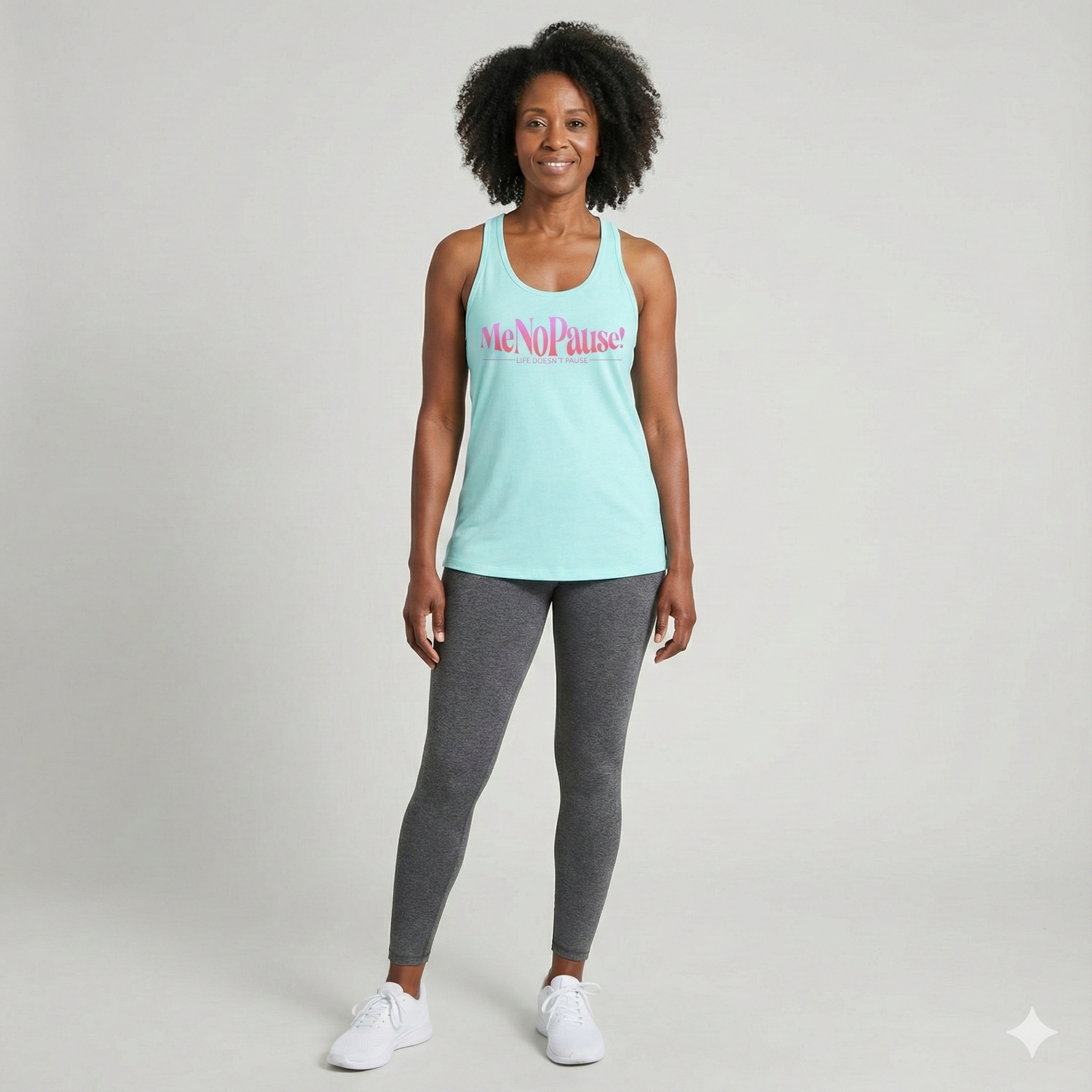 Woman wearing women’s racerback tank in cancun, with MeNoPause!™ pink logo on the front.