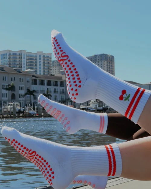 Grip socks soles up in the sun