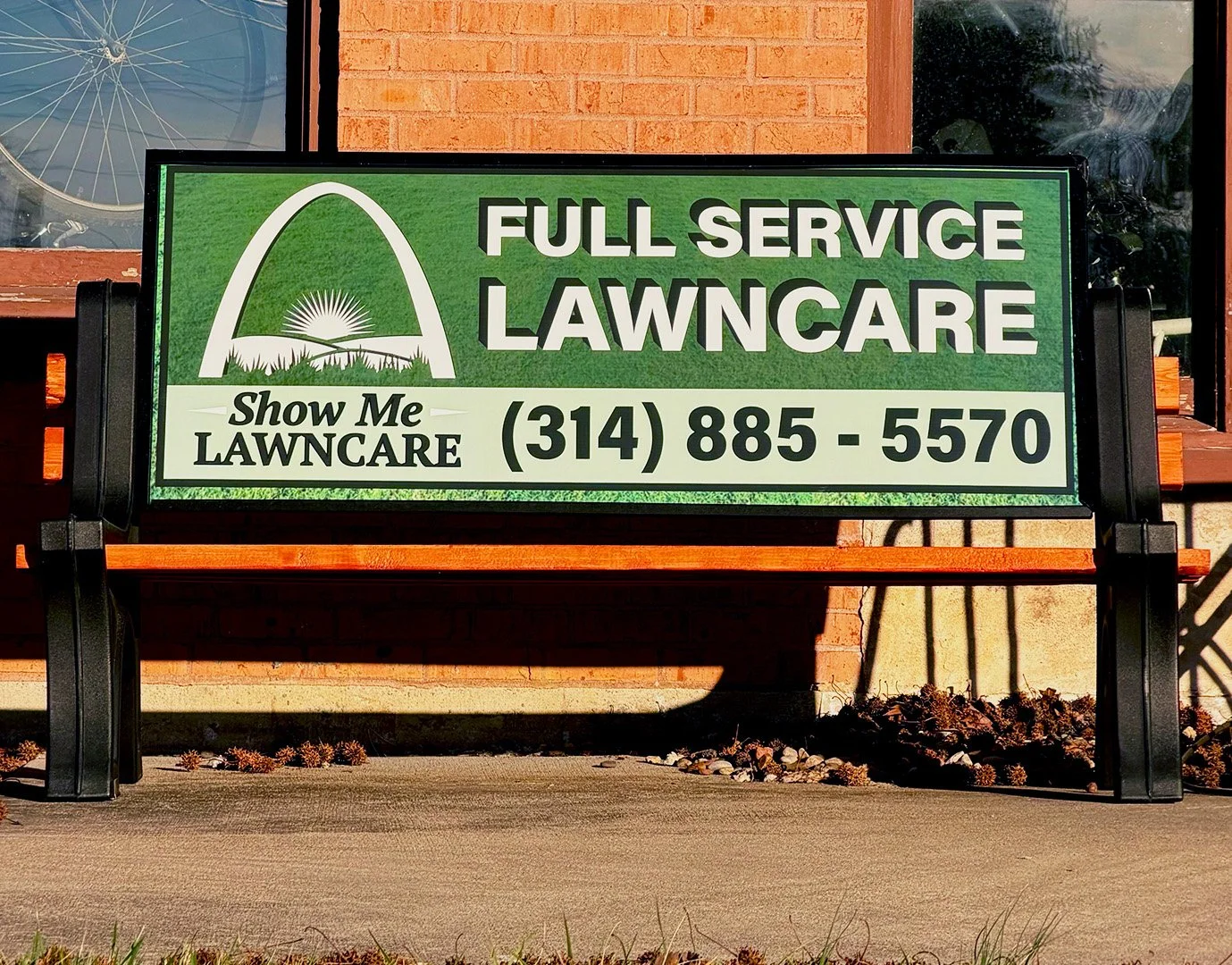 Show Me Lawn Care bench billboard