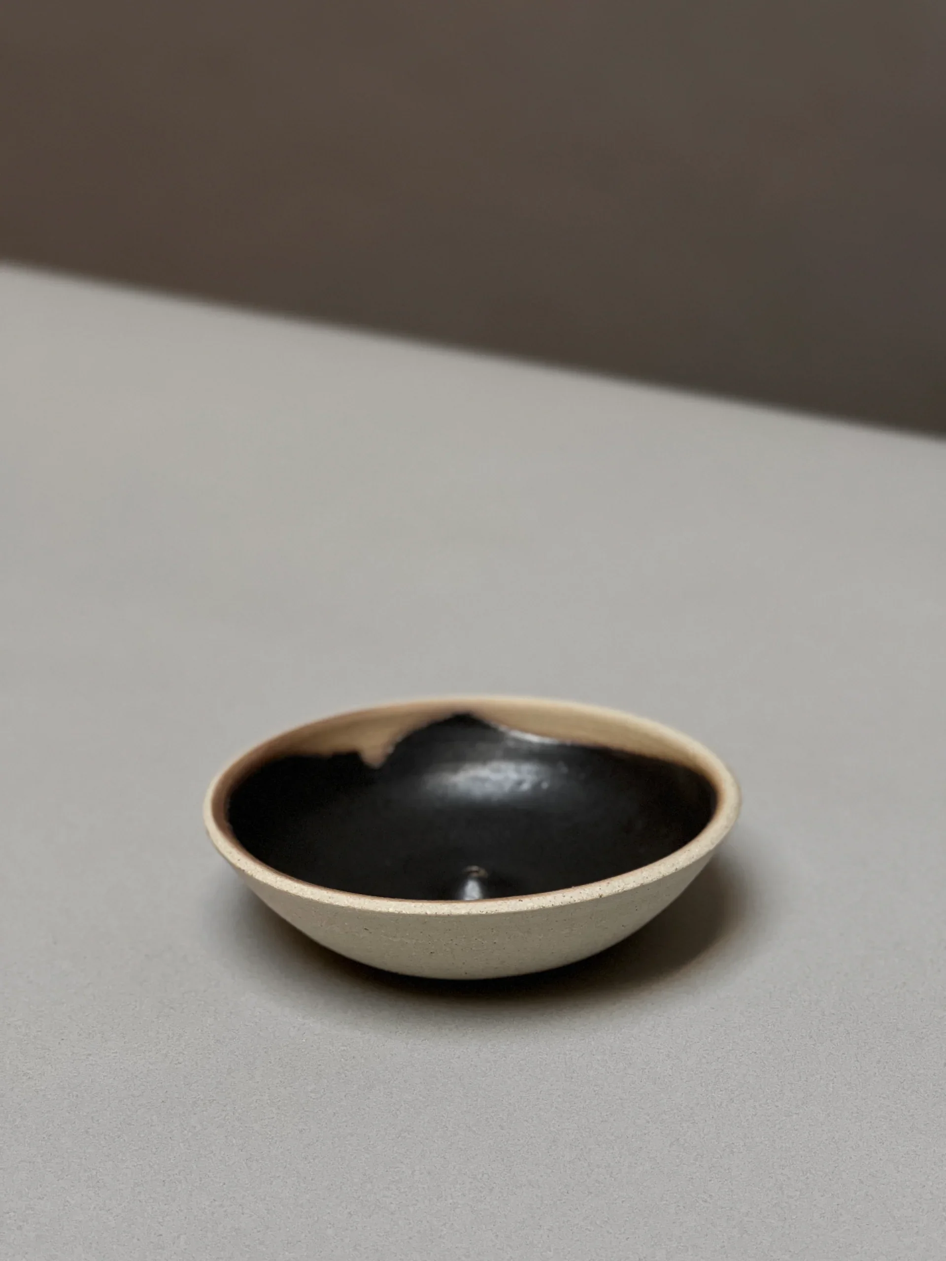 Black clay incense holder