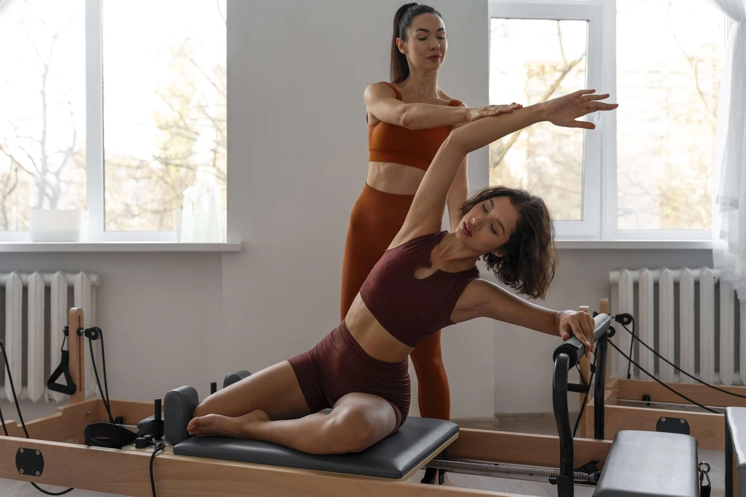 people-taking-pilates-reformer-class-2.jpg