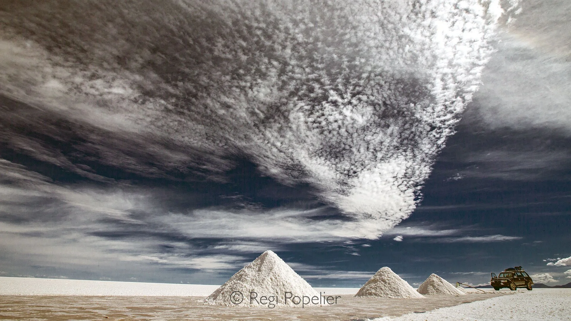 BOL006 -  Spotted cloud formation over Salar de Uyuni Bolivia’s surreal salt desert at its most extraordinary.