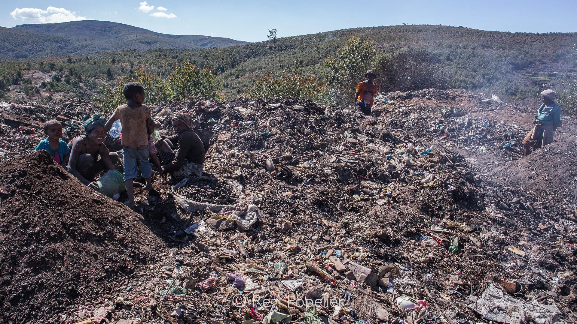 MADA036 - Survival in the Soil.
A family sorting waste on a landfill to produce and sell compost.