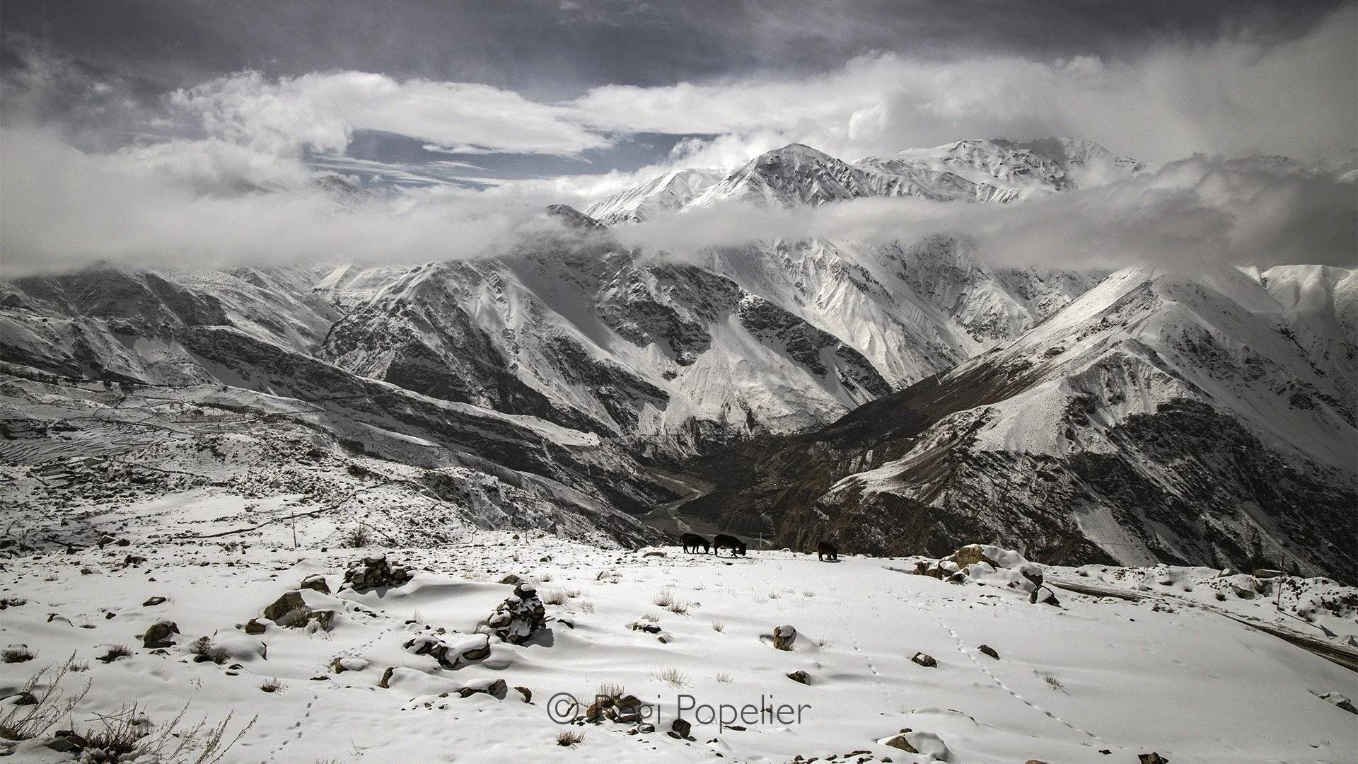 HIMA003 - Clouds adding a mystical touch to the mountains.  