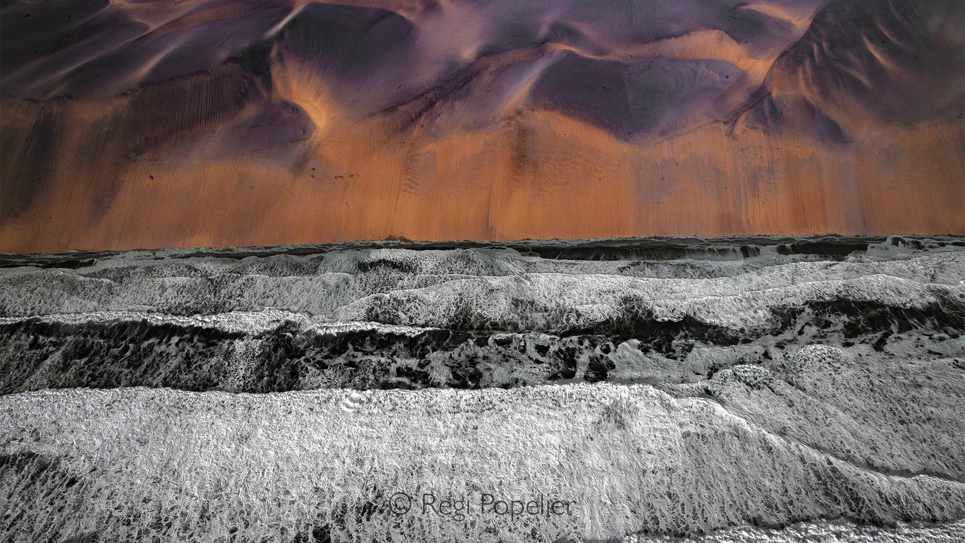 Namibia048 - A study in photographic variance. By altering both the perspective and the time of day, the visual dynamics of the colony are completely transformed. The contrast between yesterday's warm, oxygen rich surf and today’s unique atmospheric 