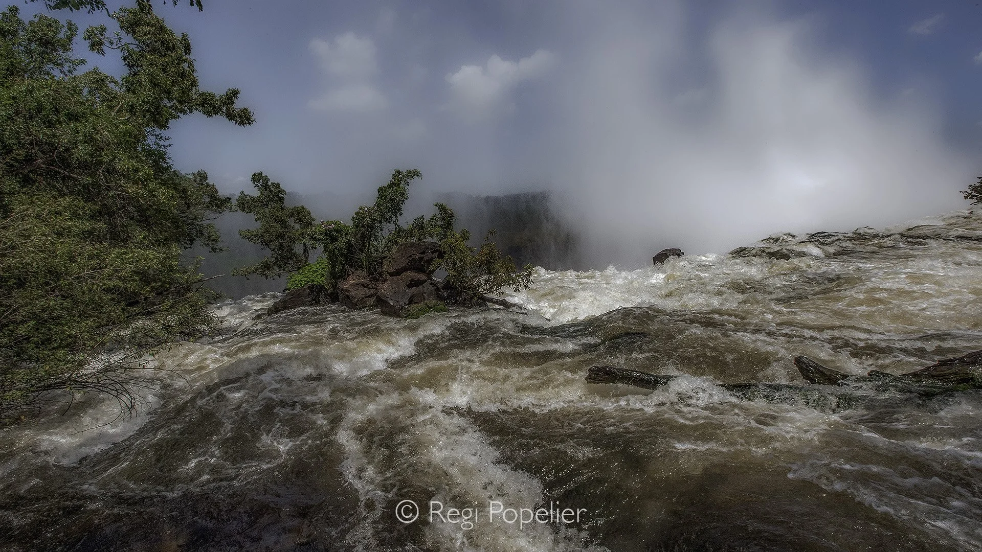 ZAMBIA043 - The plunge into the famous Victoria falls. 