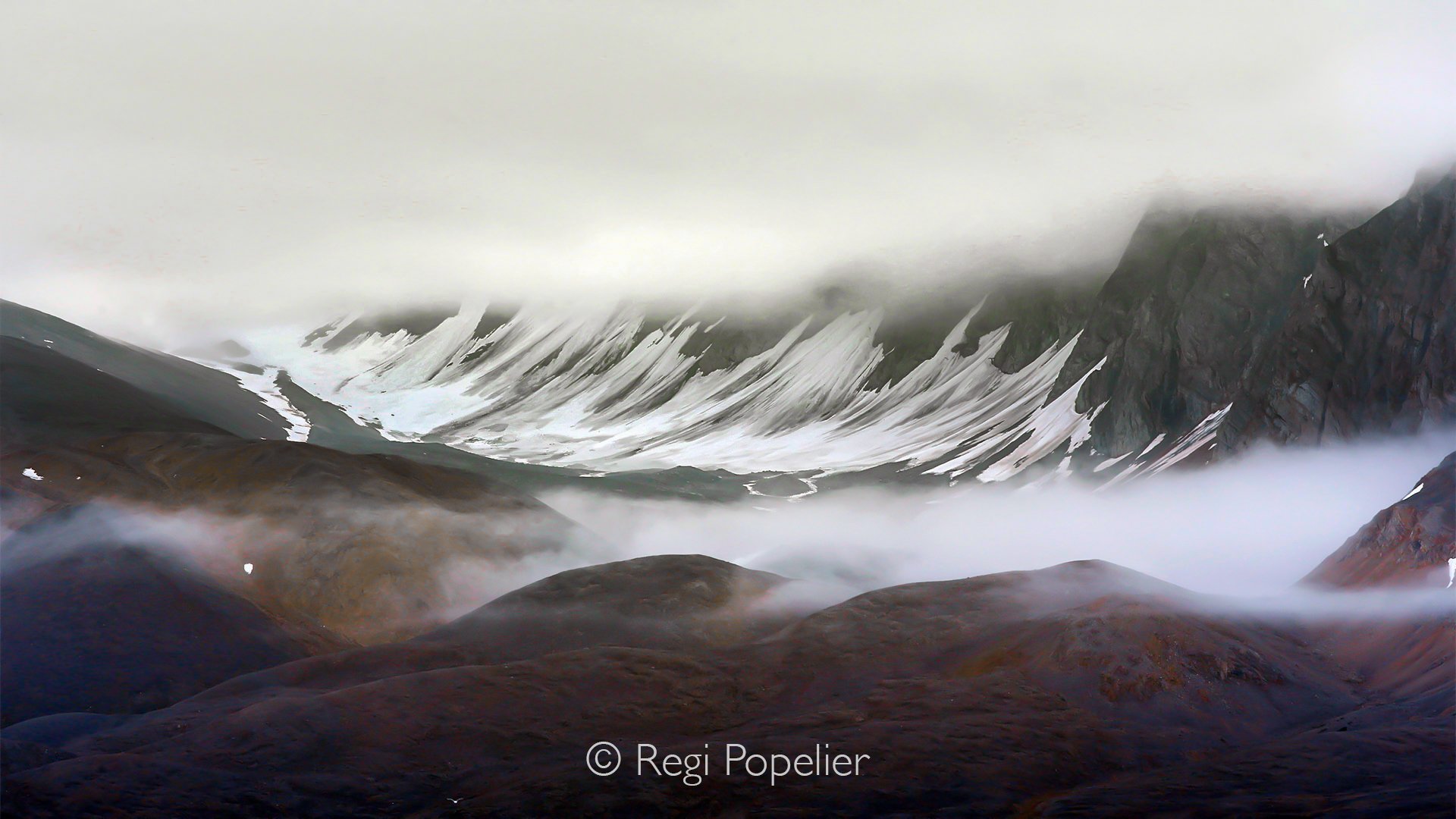 NPOLE014 - Soft fog drifts through the valleys, creating a mysterious and ever-changing scene.