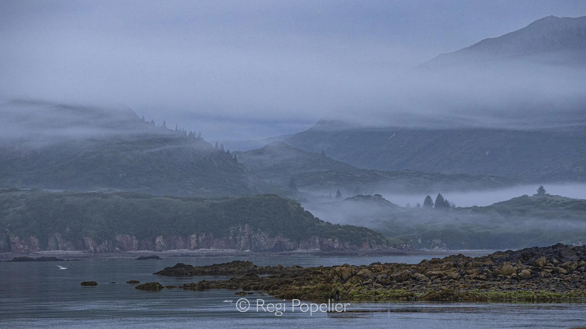 AL015 - Cloudy skies and unique views create a landscape of serene beauty. Katmai