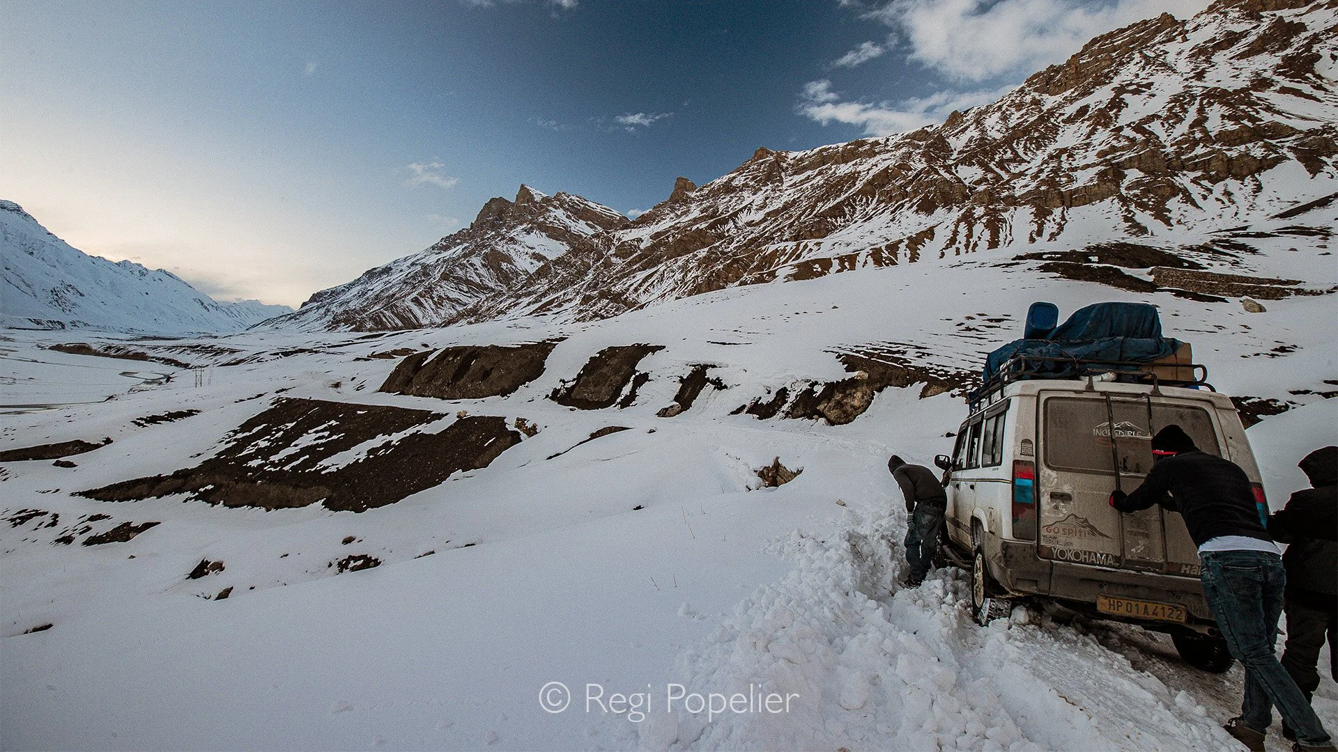 HIMA007 - Avalanches blocked the road long before we reached our destination, leaving us stranded in a cozy homestay where everyone was incredibly helpful. They set up a petrol stove in our room to keep us warm, but the smell was so strong we had to 