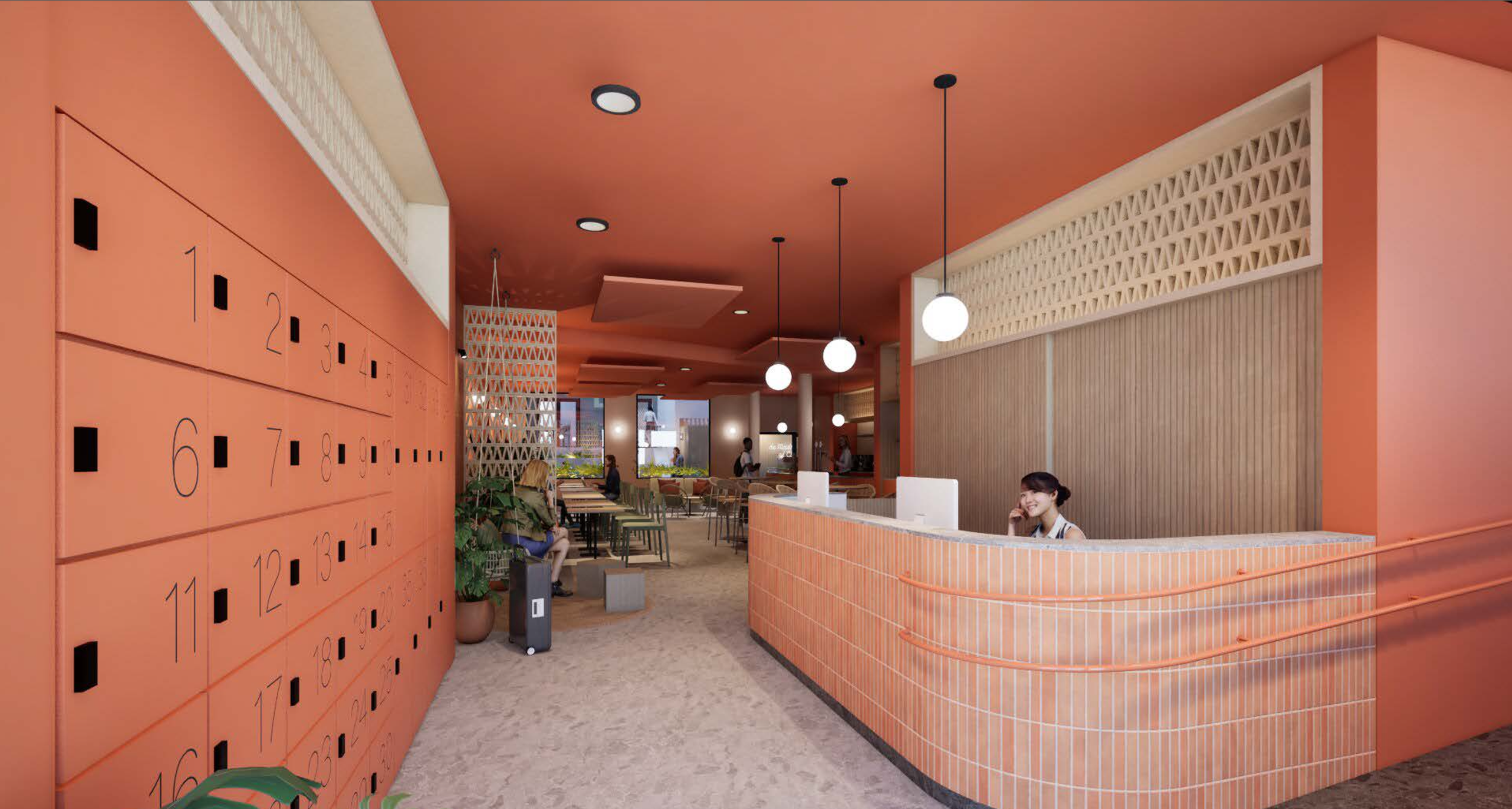 Vestíbulo de un cafetería con walls y mobiliario en color naranja y decoraciones en tonos cálidos. Cuenta con lockers en la izquierda, una recepcionista sonriendo en el mostrador a la derecha, y varias mesas y sillas donde están sentadas personas.