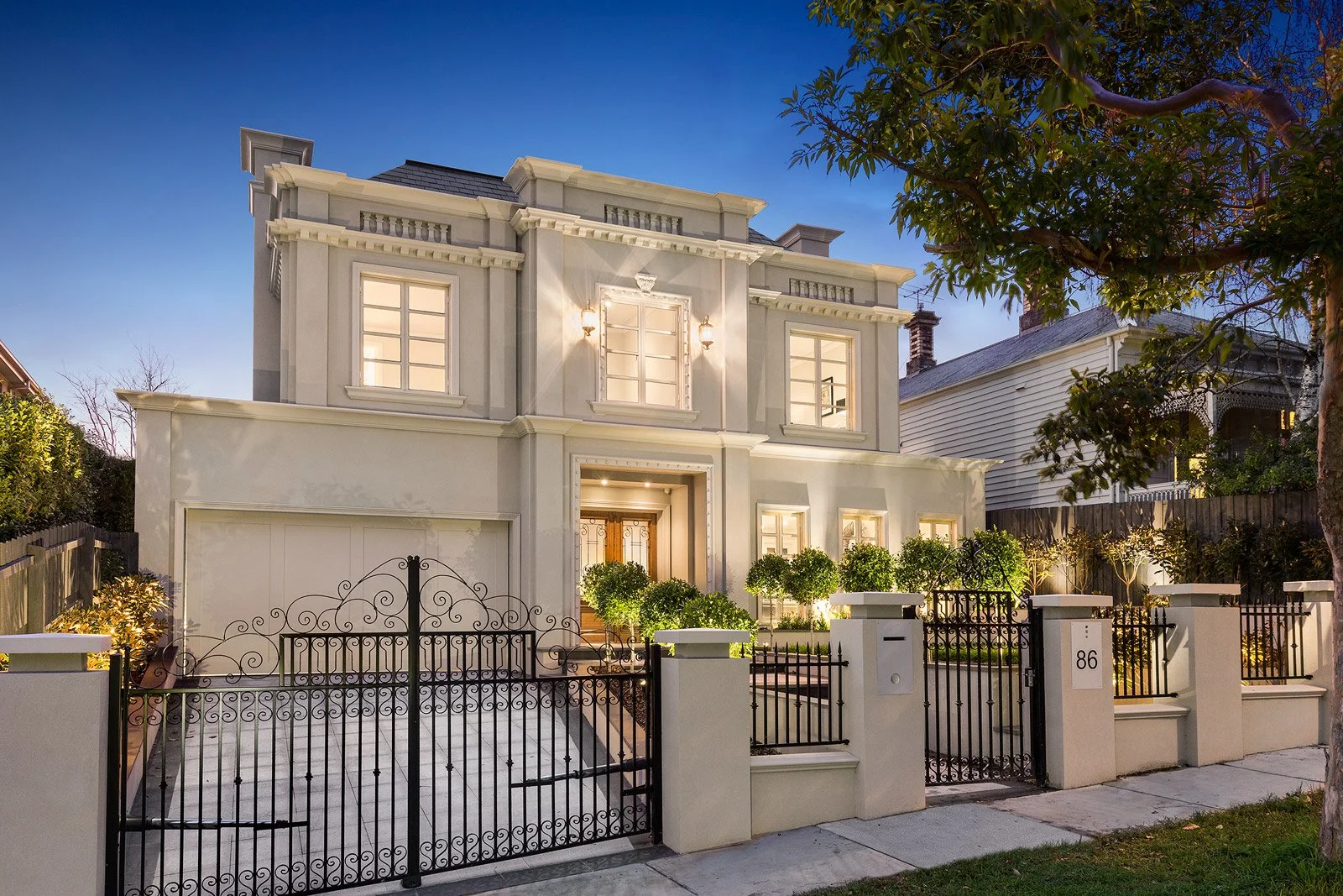hawthorn-french-provincial-mansion-facade-twilight.jpg