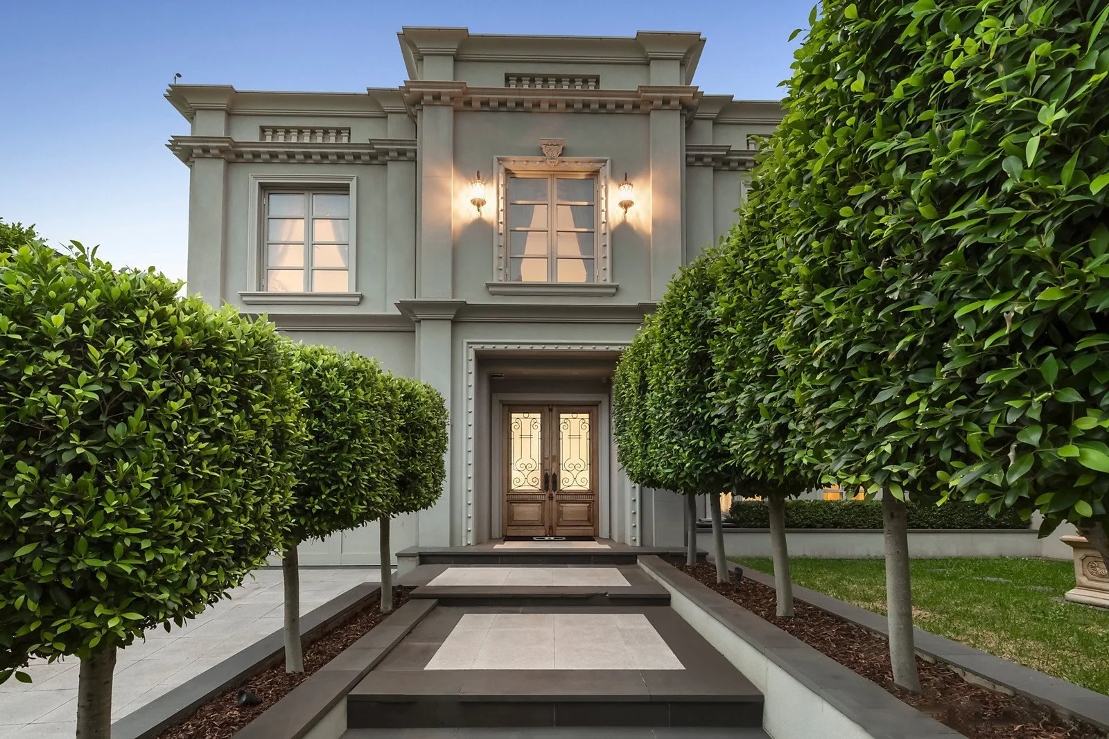 hawthorn-french-provincial-mansion-entrance-portico-topiary.jpg