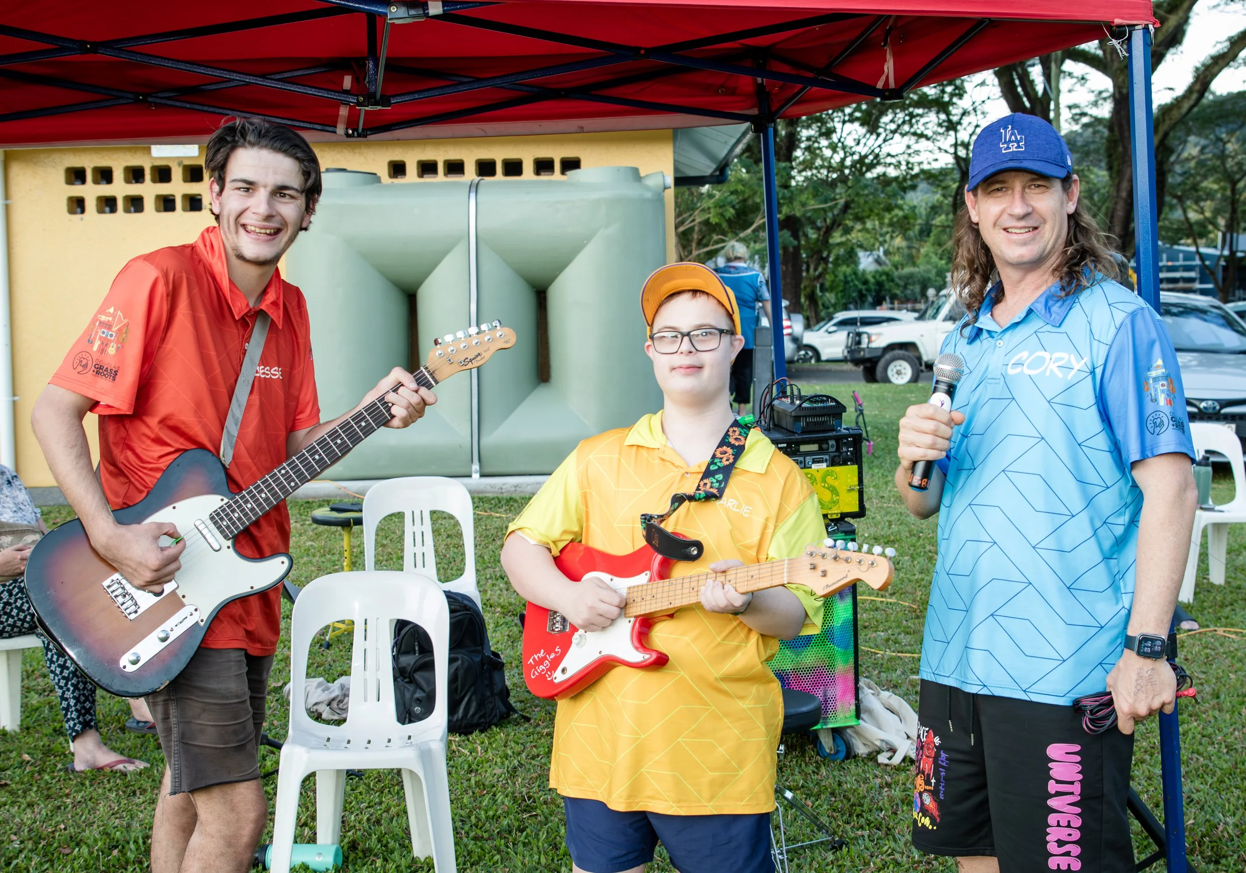 Talented Giggles performers on stage at Mossman Support Services