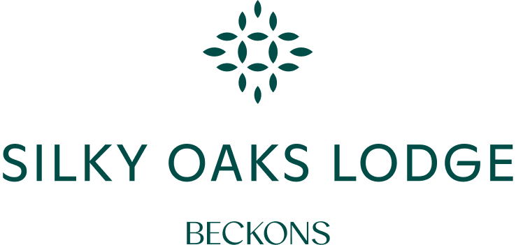 Silky Oaks Lodge logo